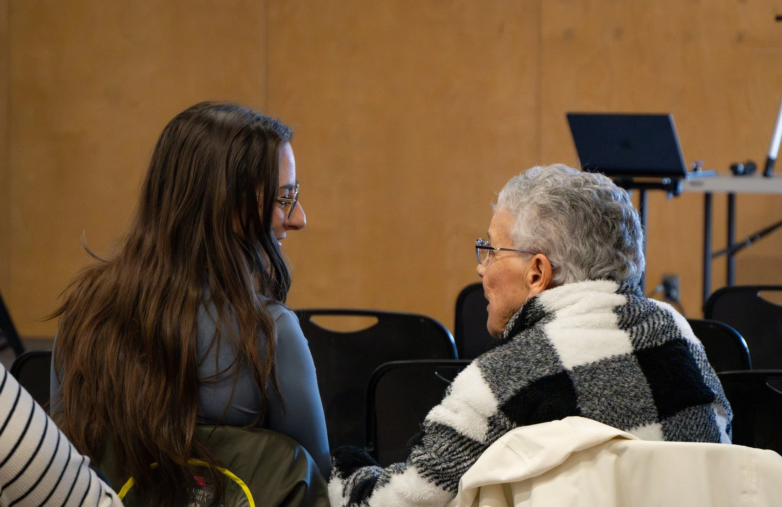 Two women speaking