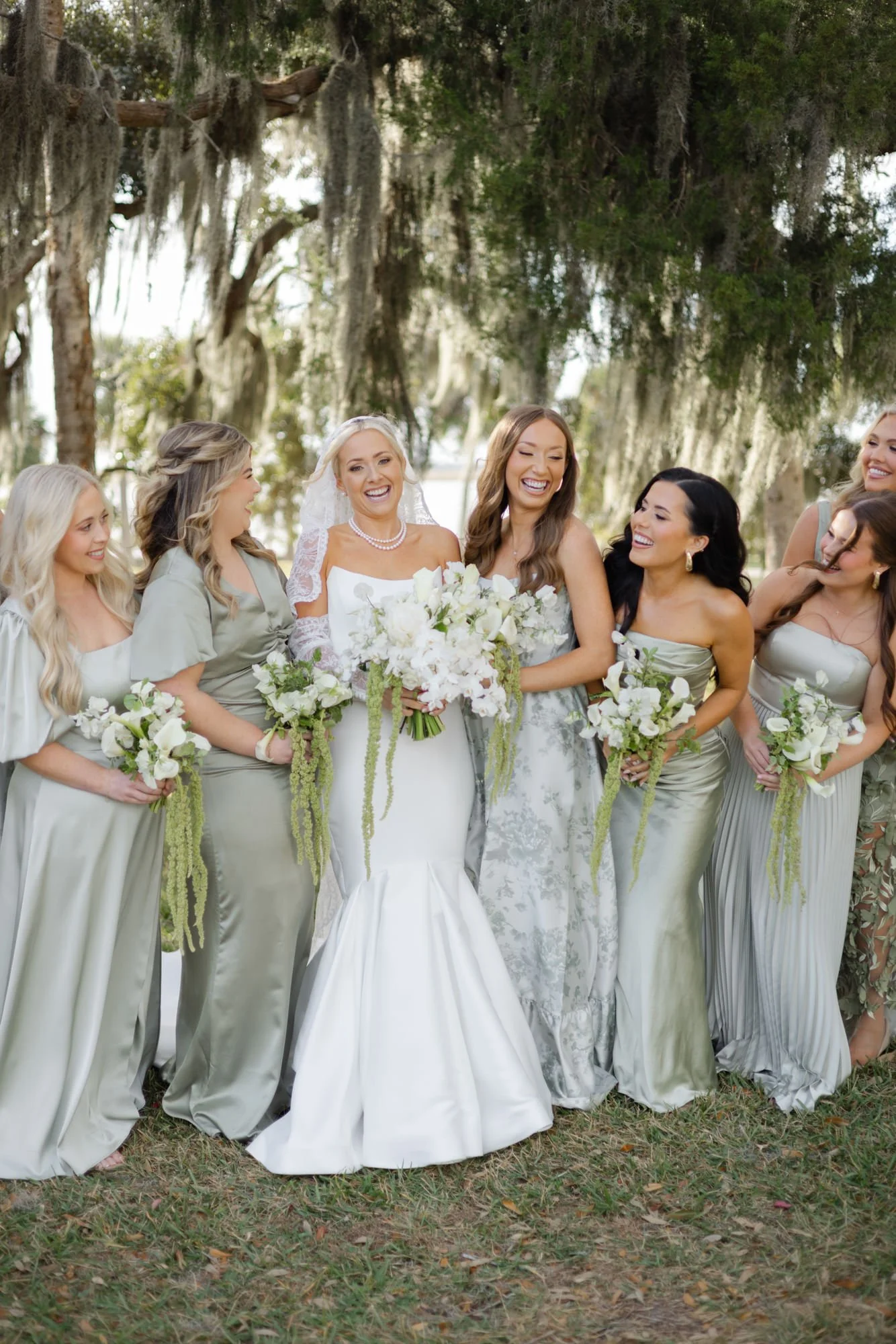 Bride and bridesmaids under South Georgia live oaks