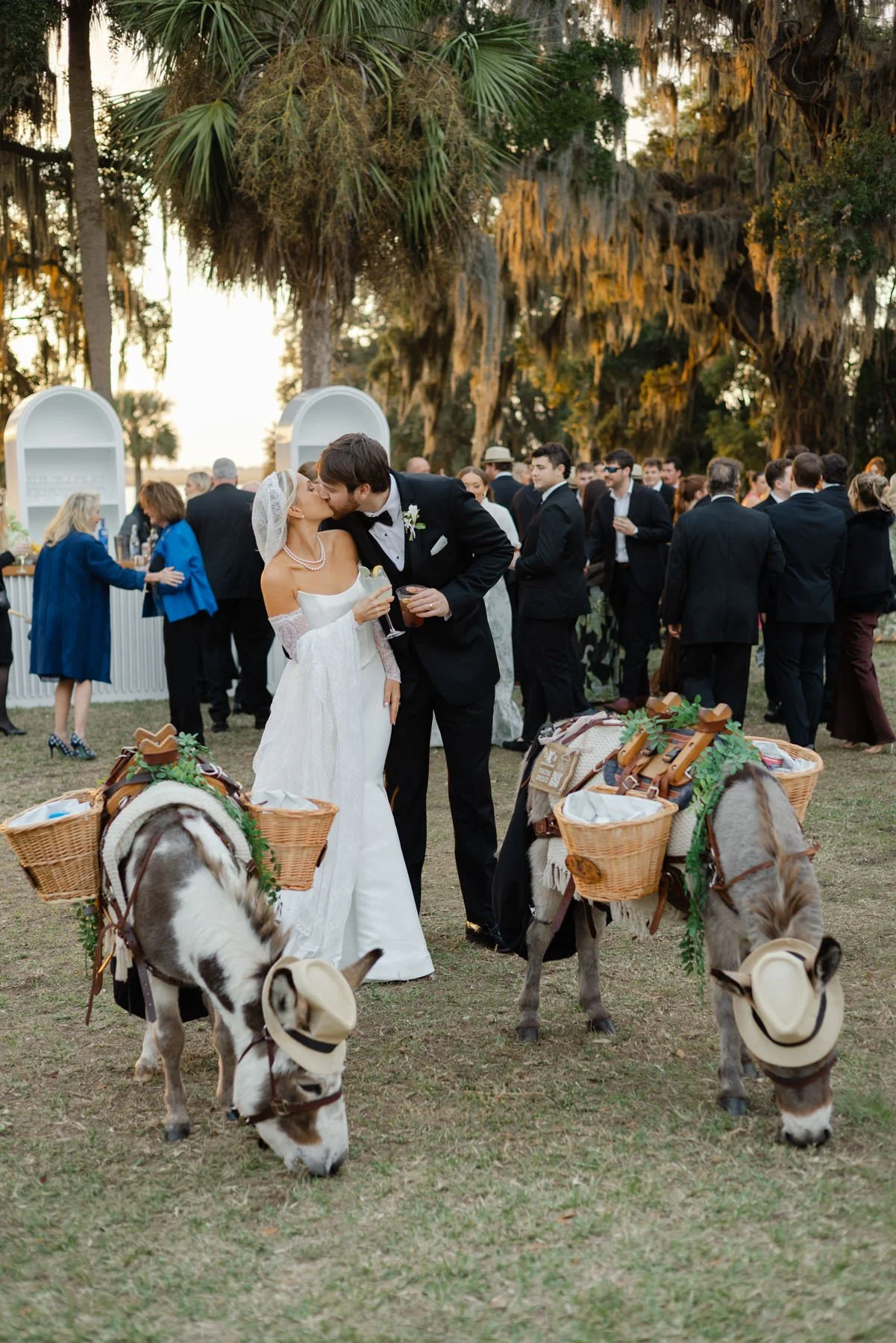 Bride and groom enjoying beer donkeys at their reception