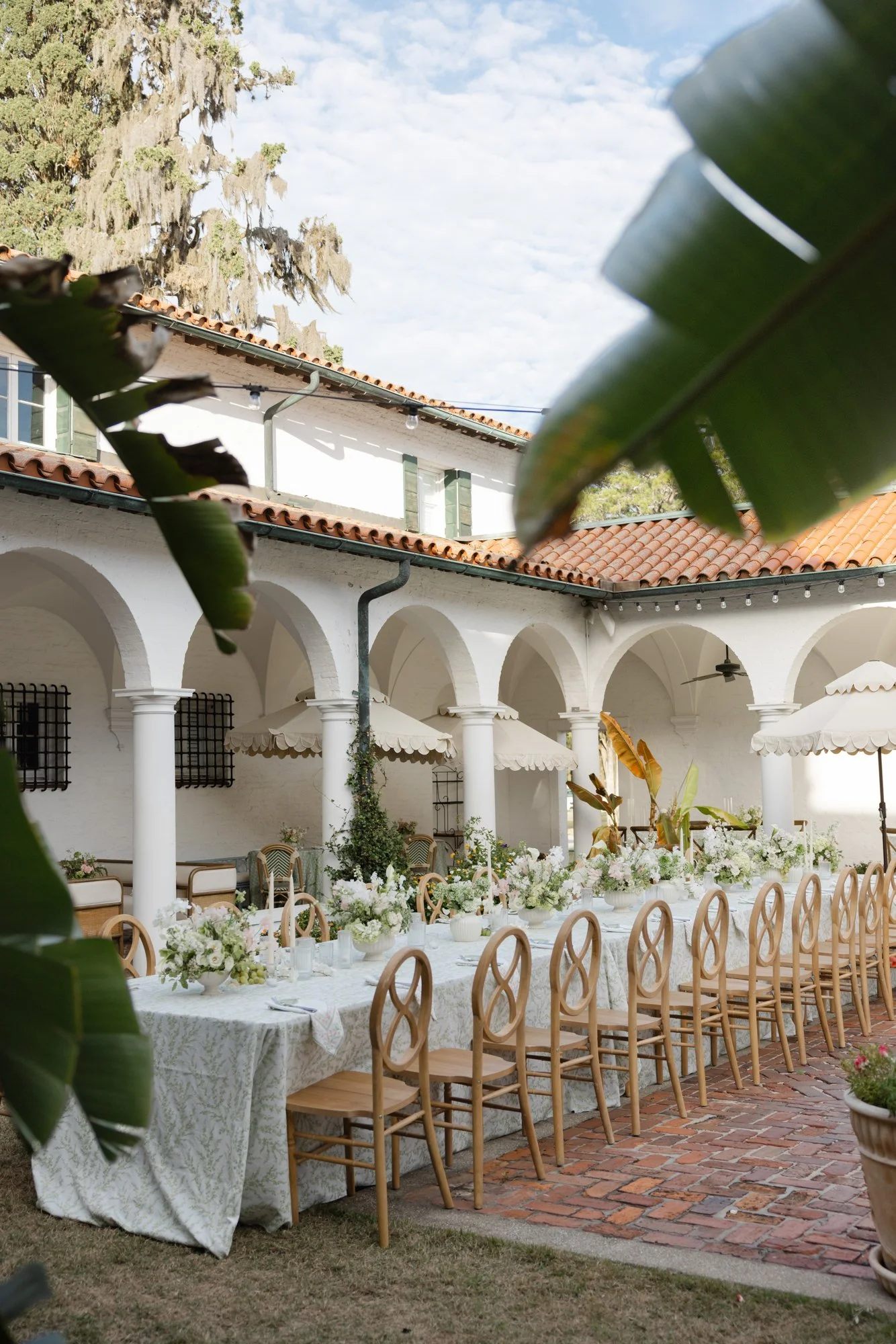 Family style tables for a Mediterranean luxury wedding on St Simons Island