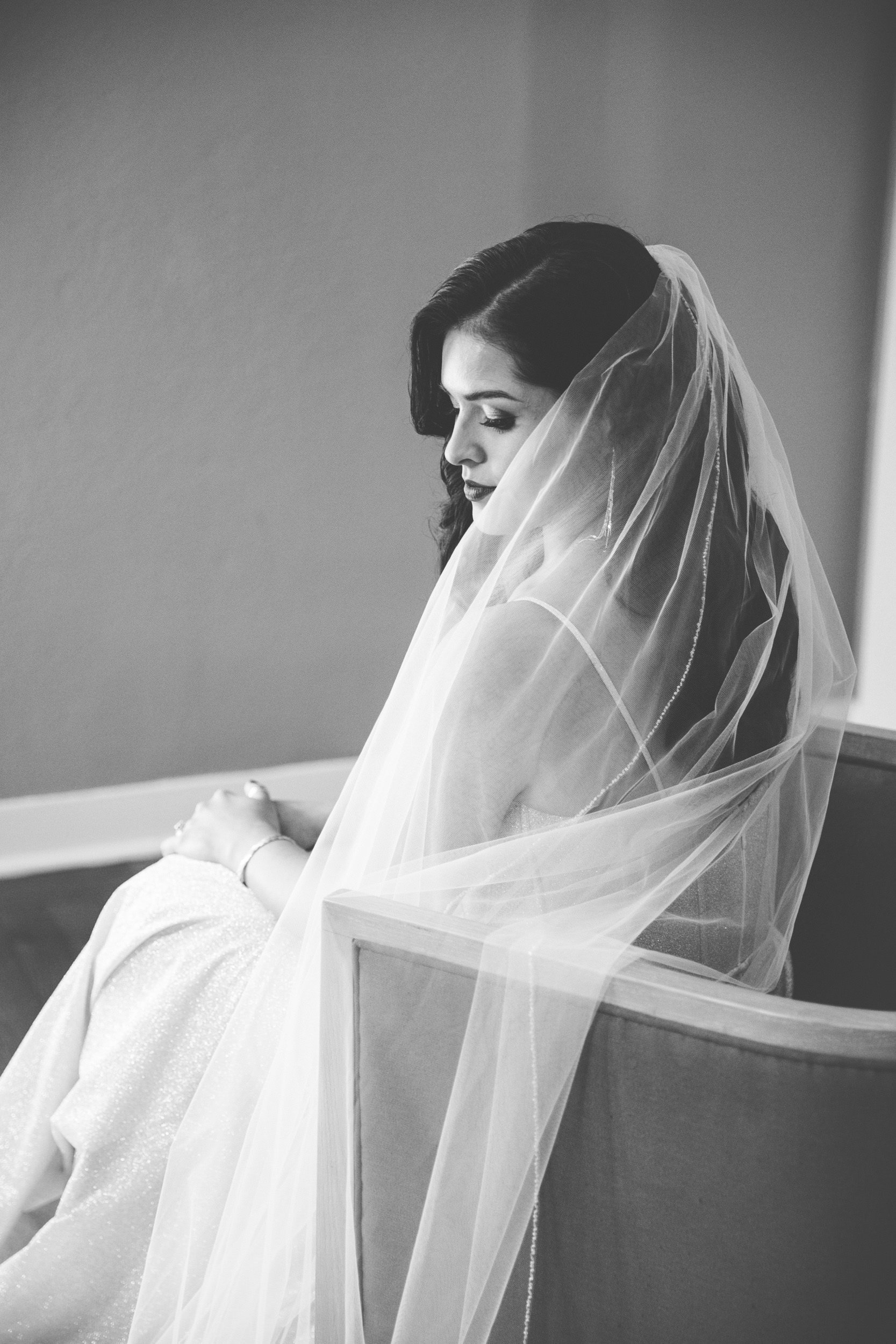 Editorial fine art portrait of a bride inside the bridal suite at Crane Cottage at Jekyll Island Club.