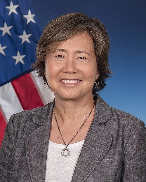 Professional headshot of a smiling women
