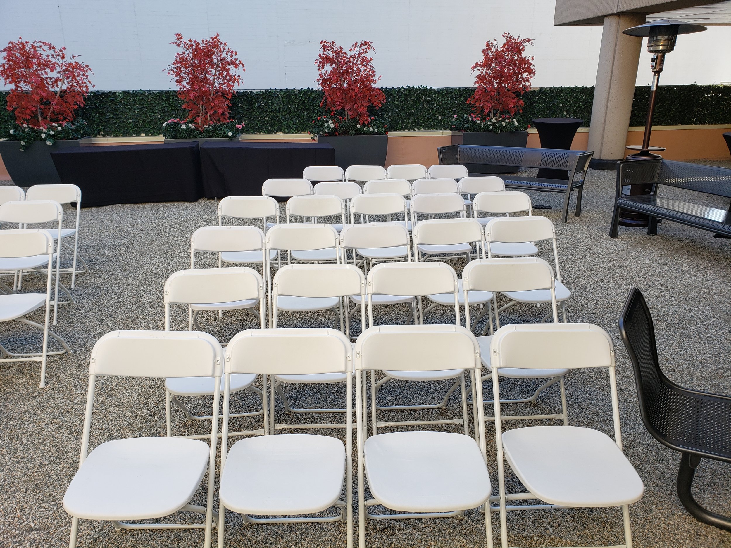            White folding chair rentals Jacksonville FL