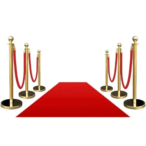 Red carpet with gold stanchions and red velvet ropes.