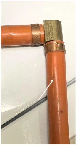 Close-up of Kitec Pipe.  Starting to fail with visible blisters