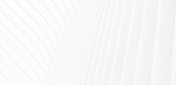 Close-up of white architectural or decorative vertical and curved panels.
