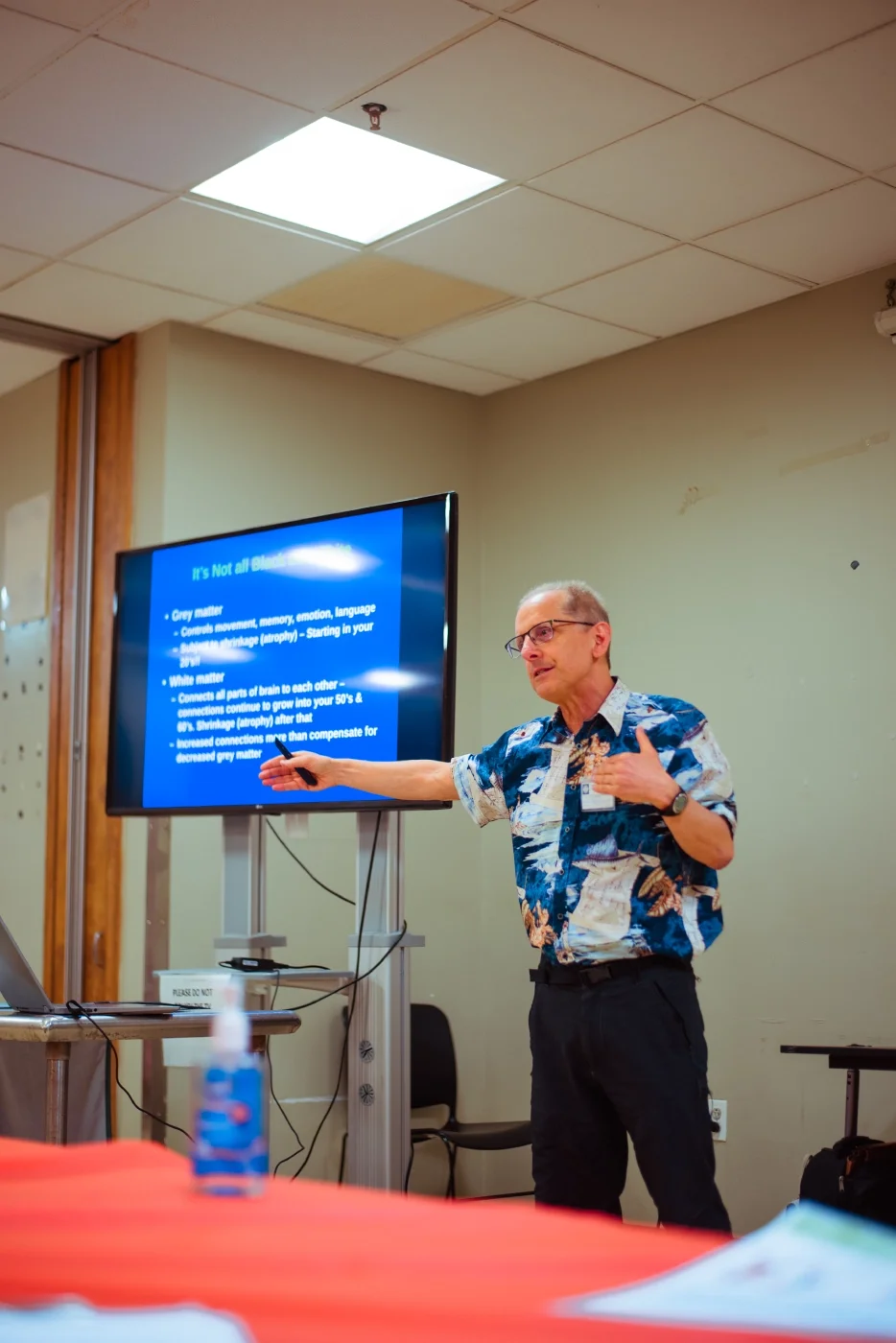 A CCMP volunteer doctor leads a medical education and information session.