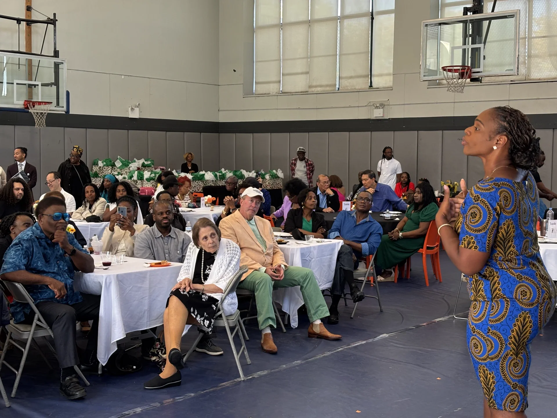 A volunteer doctor address the crowd at the CCMP event.