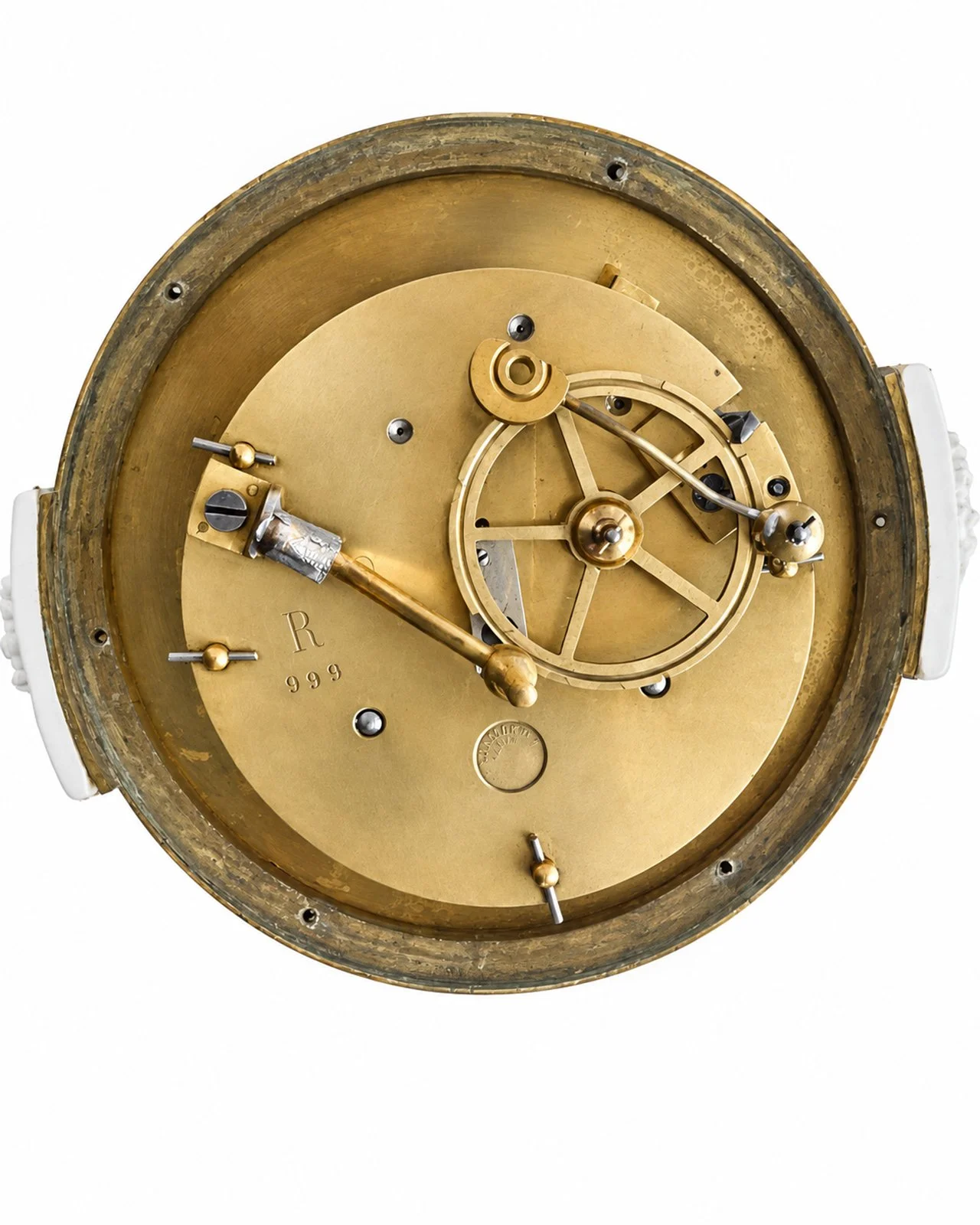 Antique Brass Clock Movement Close-Up.jpg