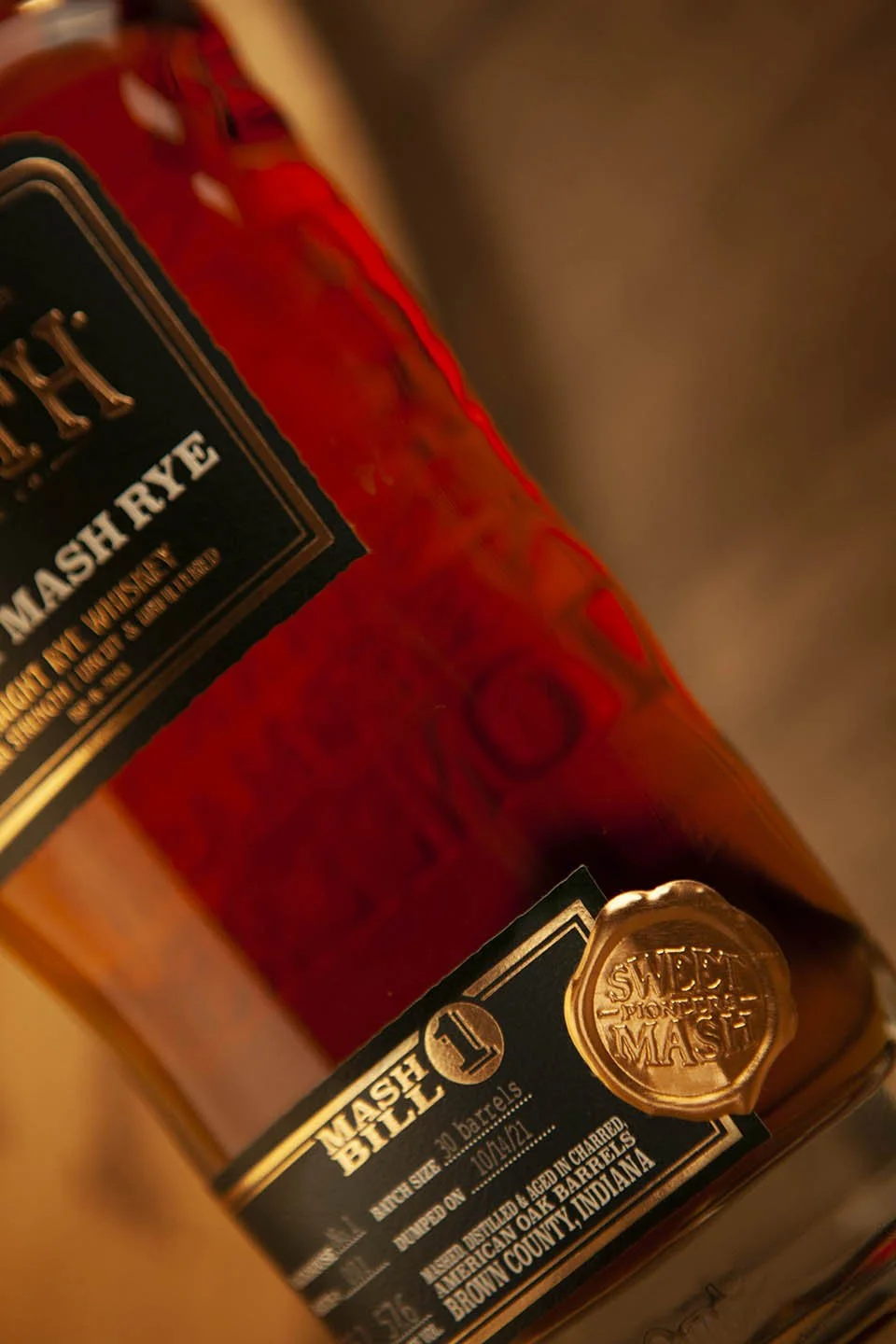 Metallic wax seal stamp on every bottle
