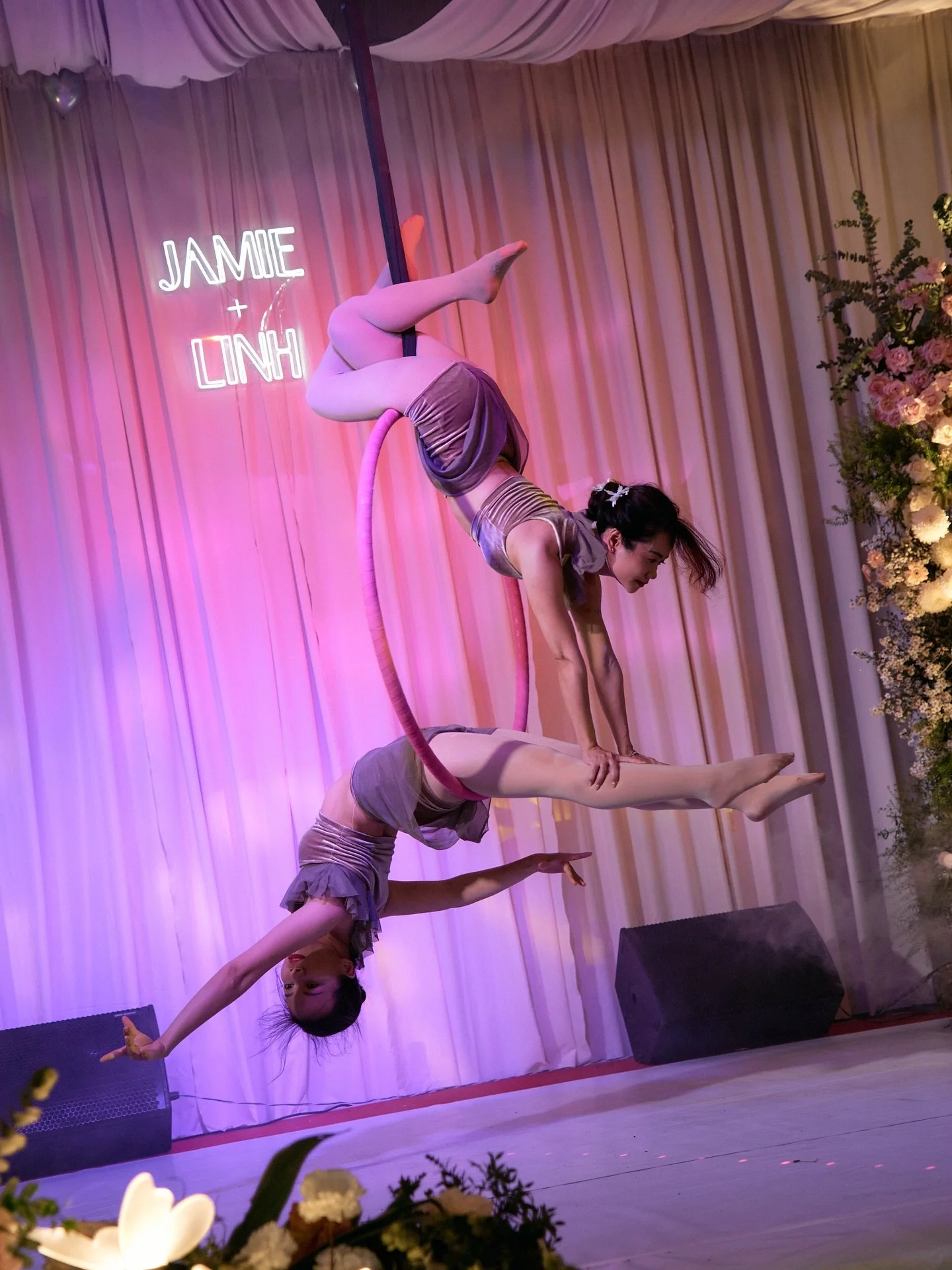 Two dancers, two journeys.

One has trained with me in HCMC for years.

The other began aerial with me and is now a pole &amp; aerial instructor in Quy Nhon.

Together, they created a dedicated duo aerial dance for a wedding - @fantasy_flying ✨

Join