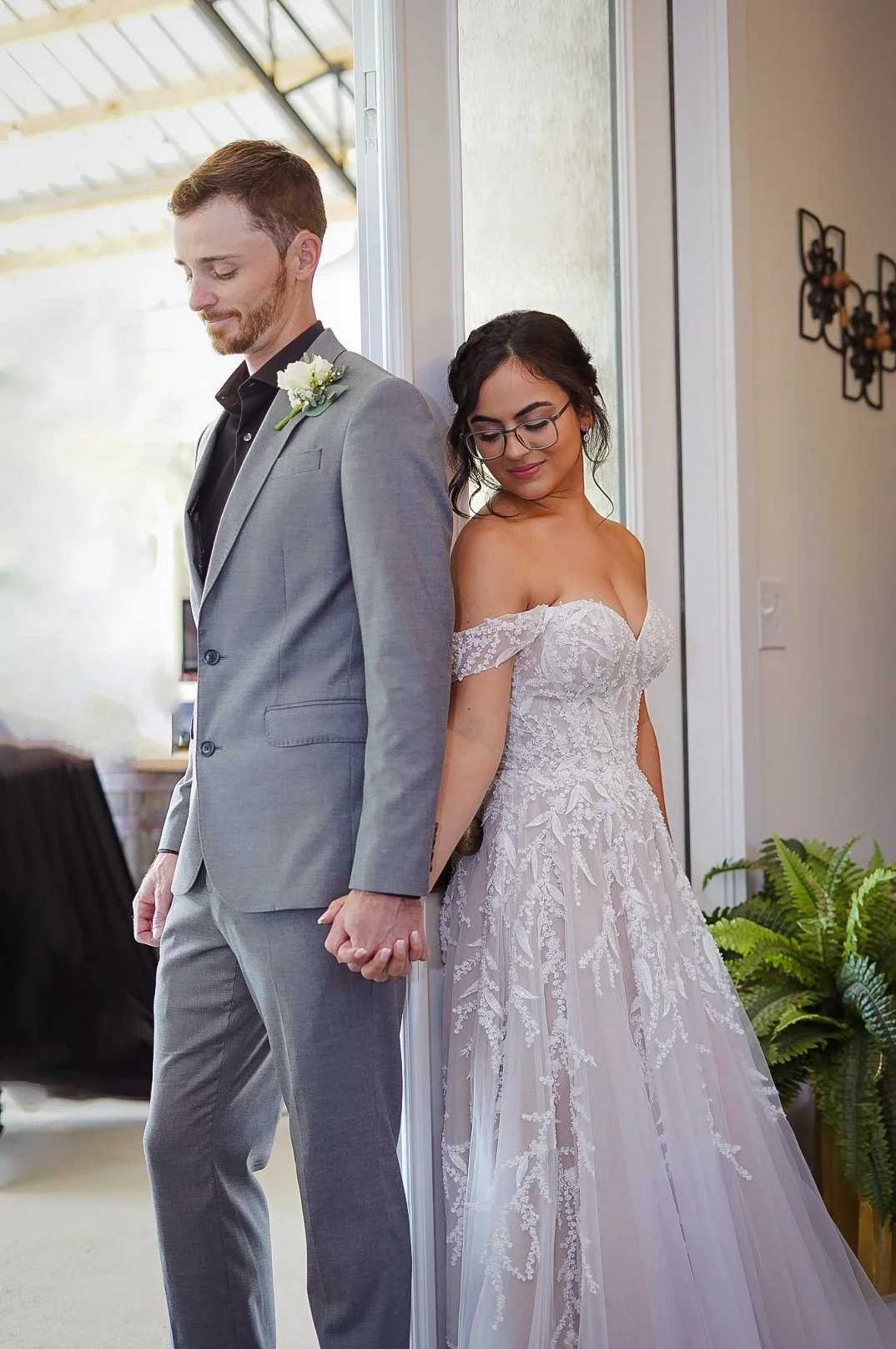 couple holding hands 