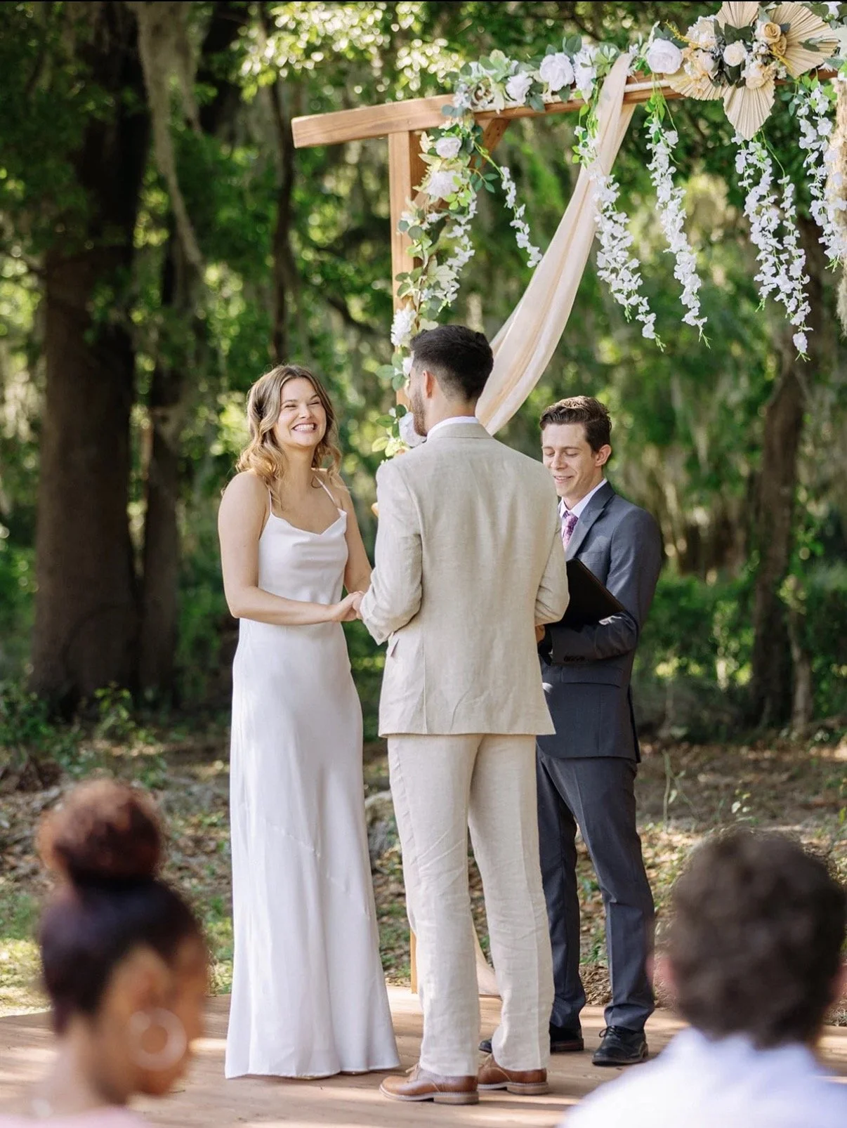 happy couple at the alter