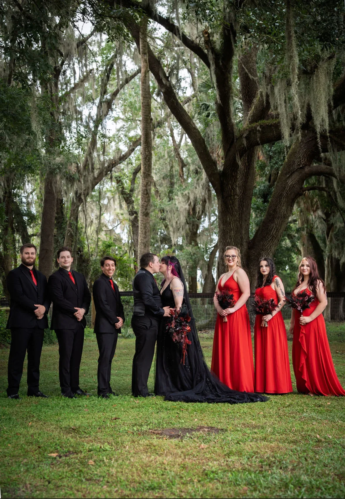 wedding party under trees 