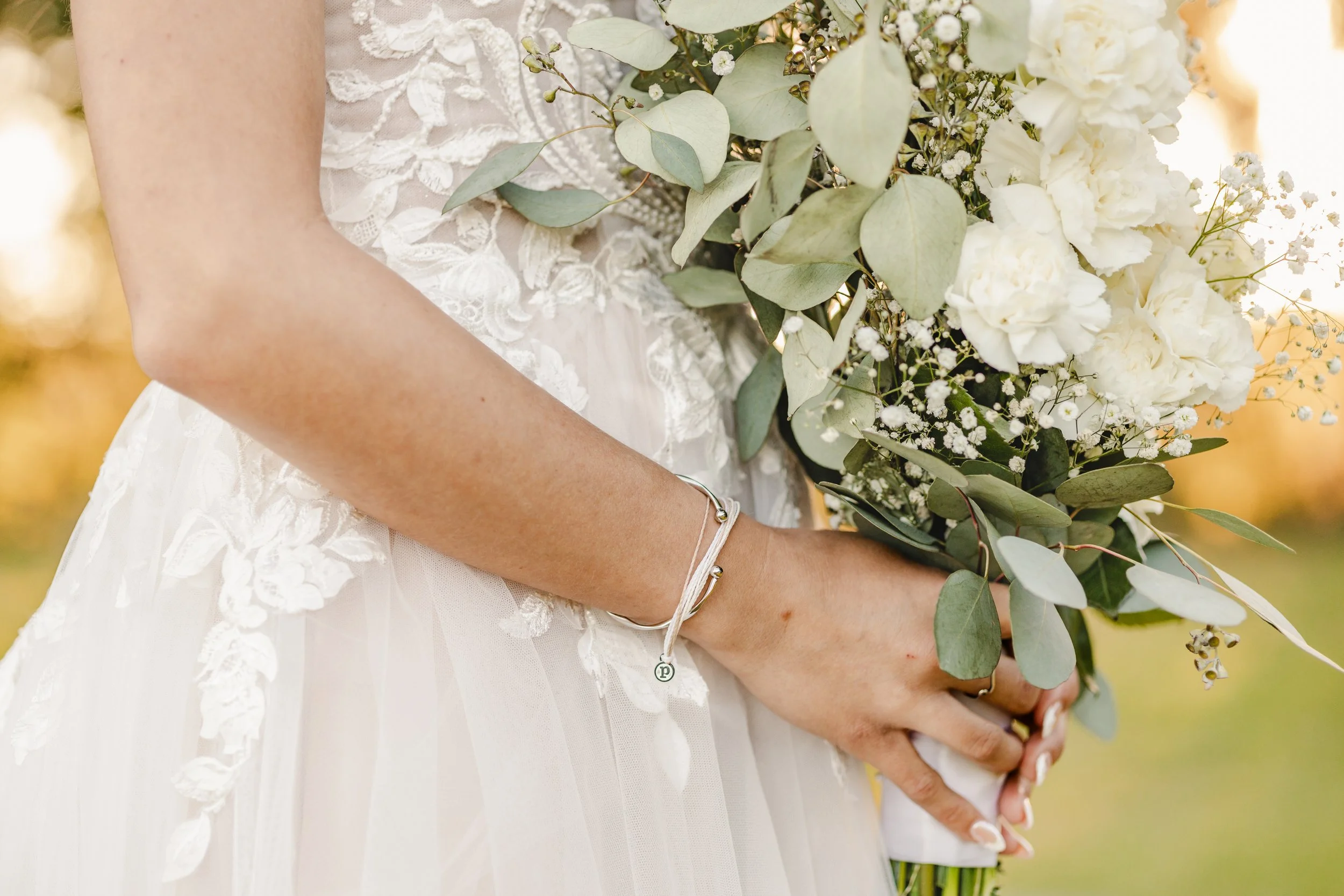 bride holding flowers