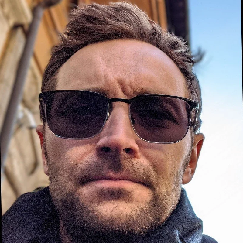 Serious Stubble Sunglass Man