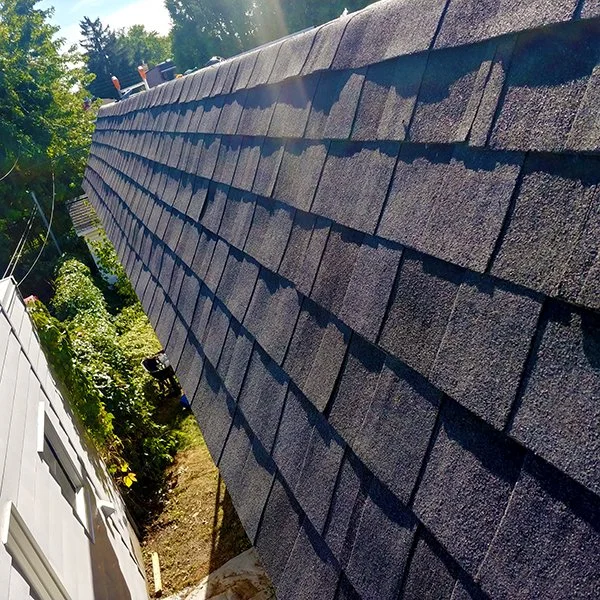 Shingle side skirt replaced on a roof in Montreal Est by Roofing-MTL