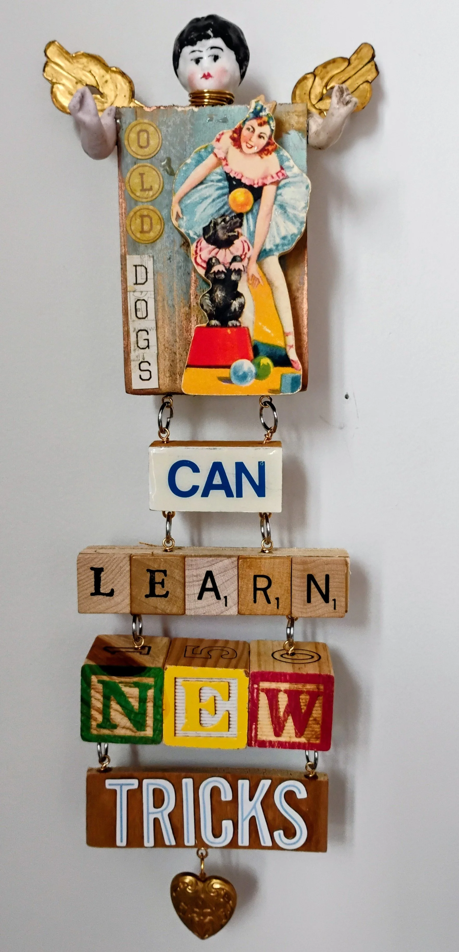 Old Dogs Can Learn New Tricks. Turning the quote into a positive. Vintage wood circus toy. $150.00