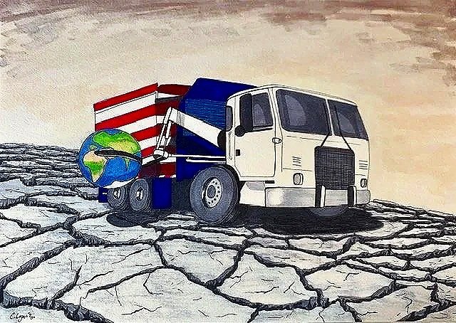 A truck with an American flag, a globe, and a rocket symbol on its side, standing on cracked dry earth at sunset.