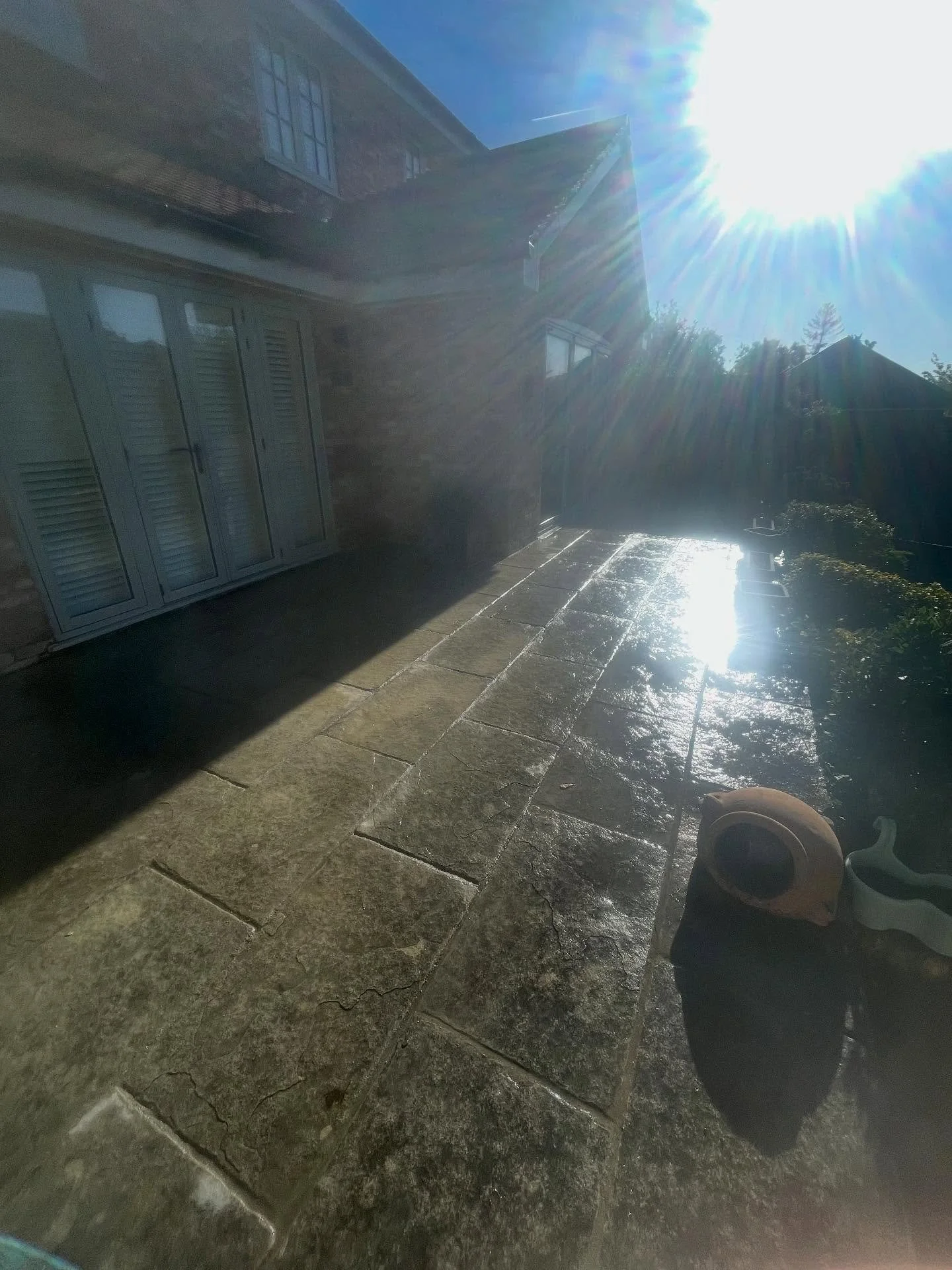 A recent removal and repointing of a patio in Great Bookham.