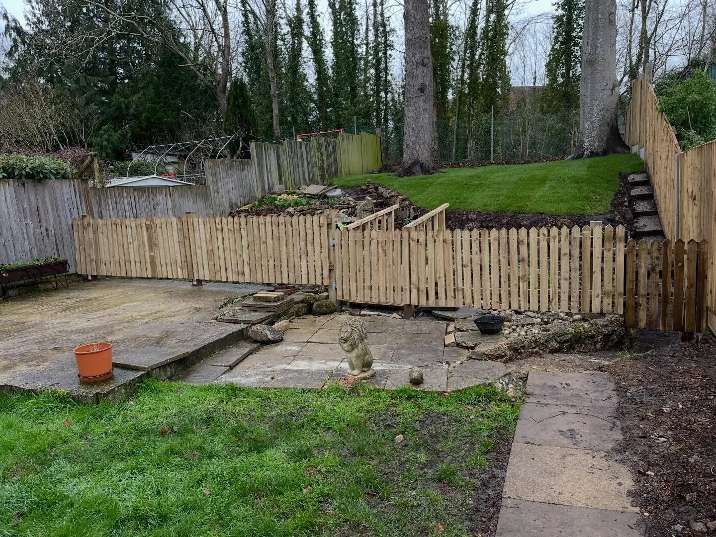 Here is one of our recent projects completed in Guilford. We were tasked to install a picket fence &amp; gate along the edge of a stream, we also installed a timber framed bridge and finally Installed a new lawn which included preparing the old groun