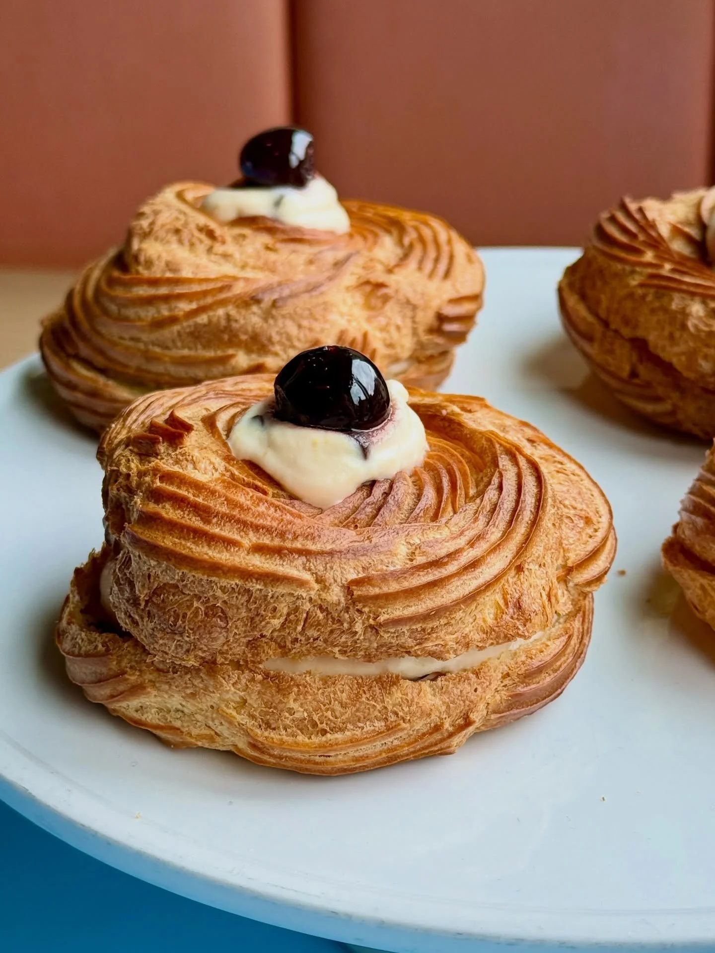 ✨ZEPPOLE DI SAN GIUSEPPE✨ a golden and perfectly sweet Sicilian treat in honor of Saint Joseph&rsquo;s Day! Fluffy choux pastry filled with a ricotta cannoli filling (orange zest, vanilla, chocolate chips) with an Amarena cherry on top! Running as a 