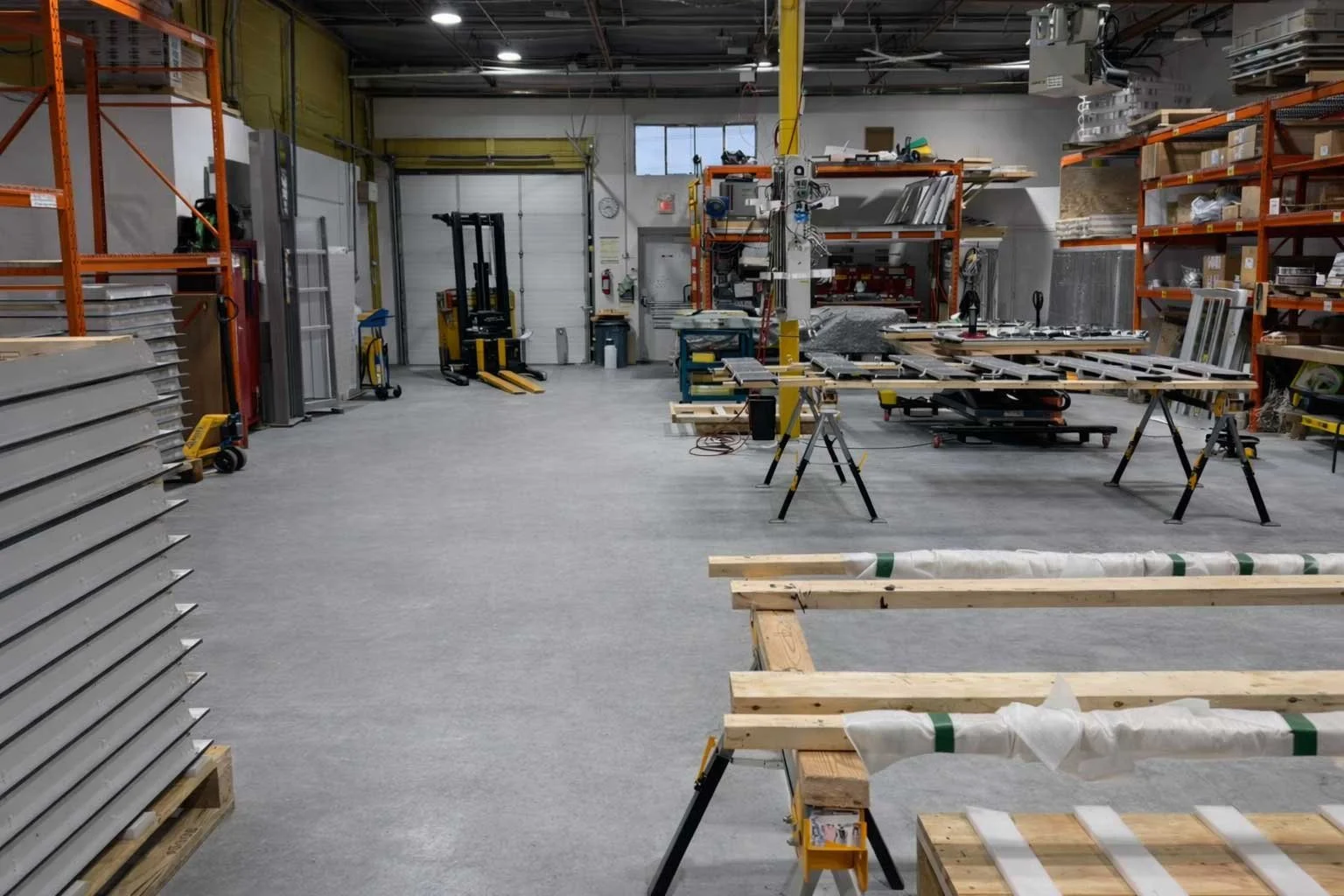 Indoor digital signage assembly stations inside B&F Solutions Inc’s Canadian manufacturing facility, supporting efficient, scalable production.