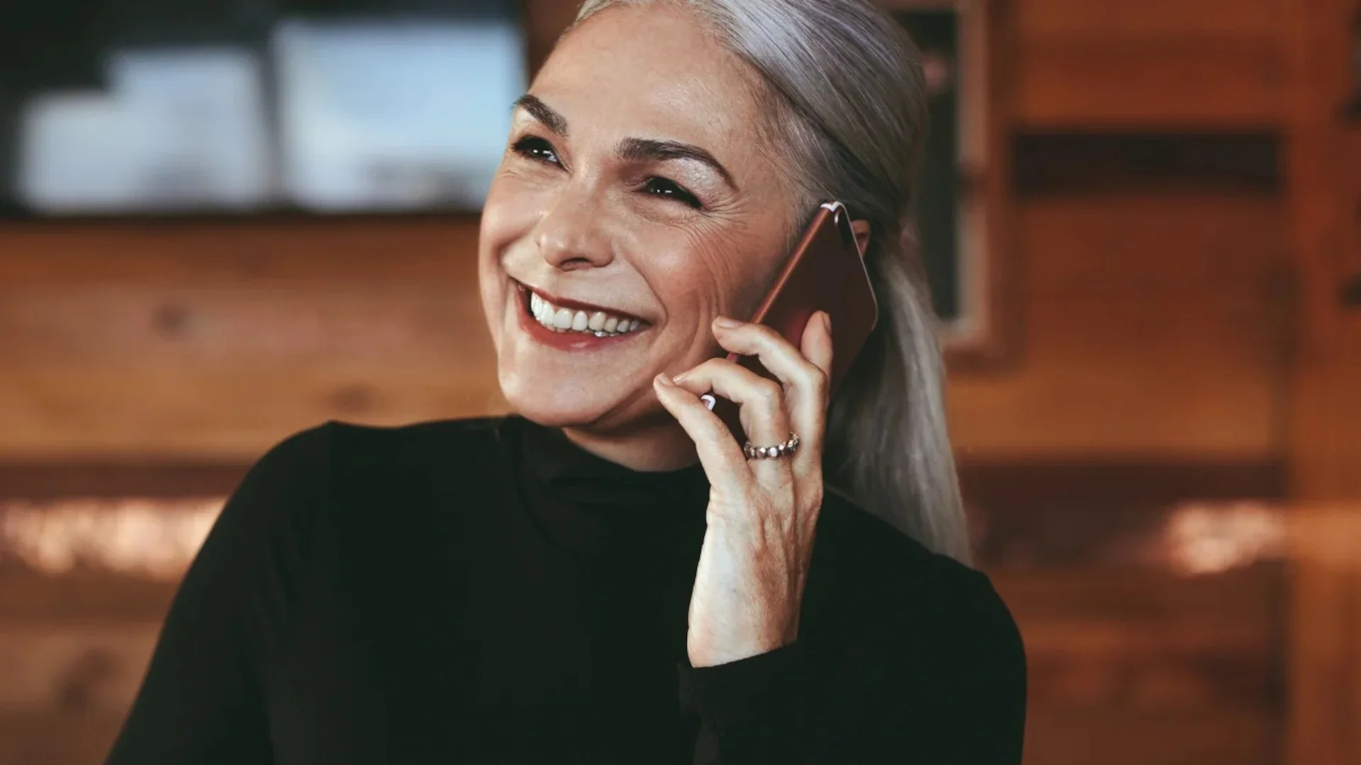 Older woman on the phone.