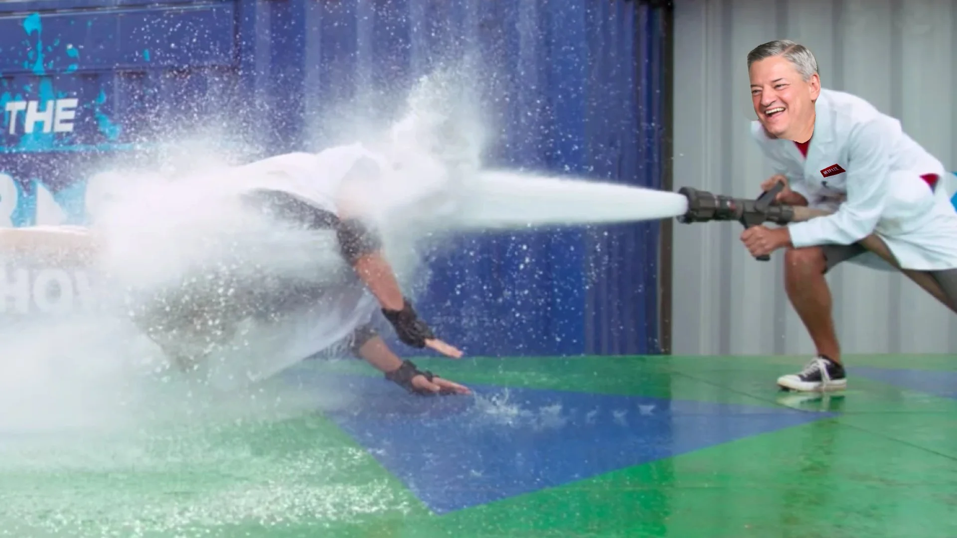 Ted Sarandos hosing down a movie director.