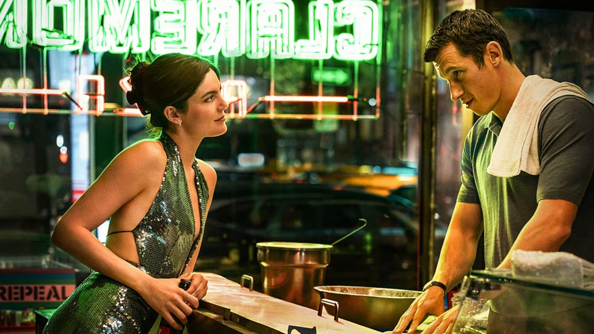 Monica barbaro and Callum Turner in One Night Only.