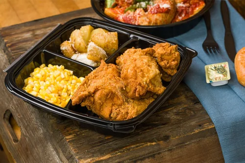 Homemade fried chicken with corn and roasted potatoes — Goose Express takeout
