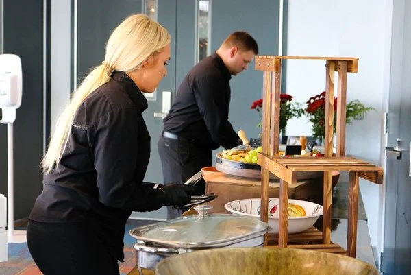 Cooked Goose Catering staff setting up for a wedding in Pittsburgh