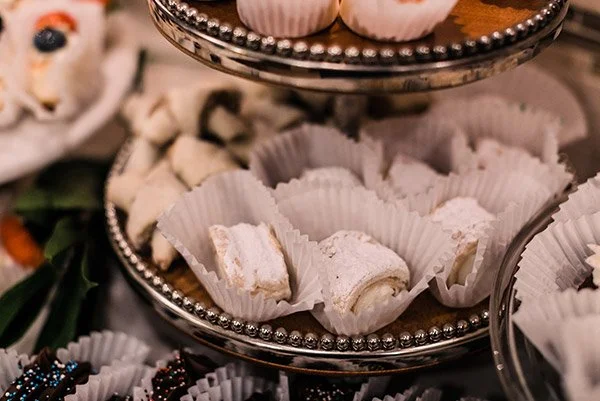 Assorted assorted cookies and candies on tiered display tray