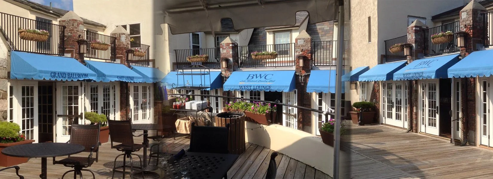 Outdoor patio area with wooden deck, tables, and chairs, surrounded by flowering plants in pots, with multi-story building featuring balconies and blue awnings reading "Grand Ballroom," "West Lounge," and "BWC" in the background.
