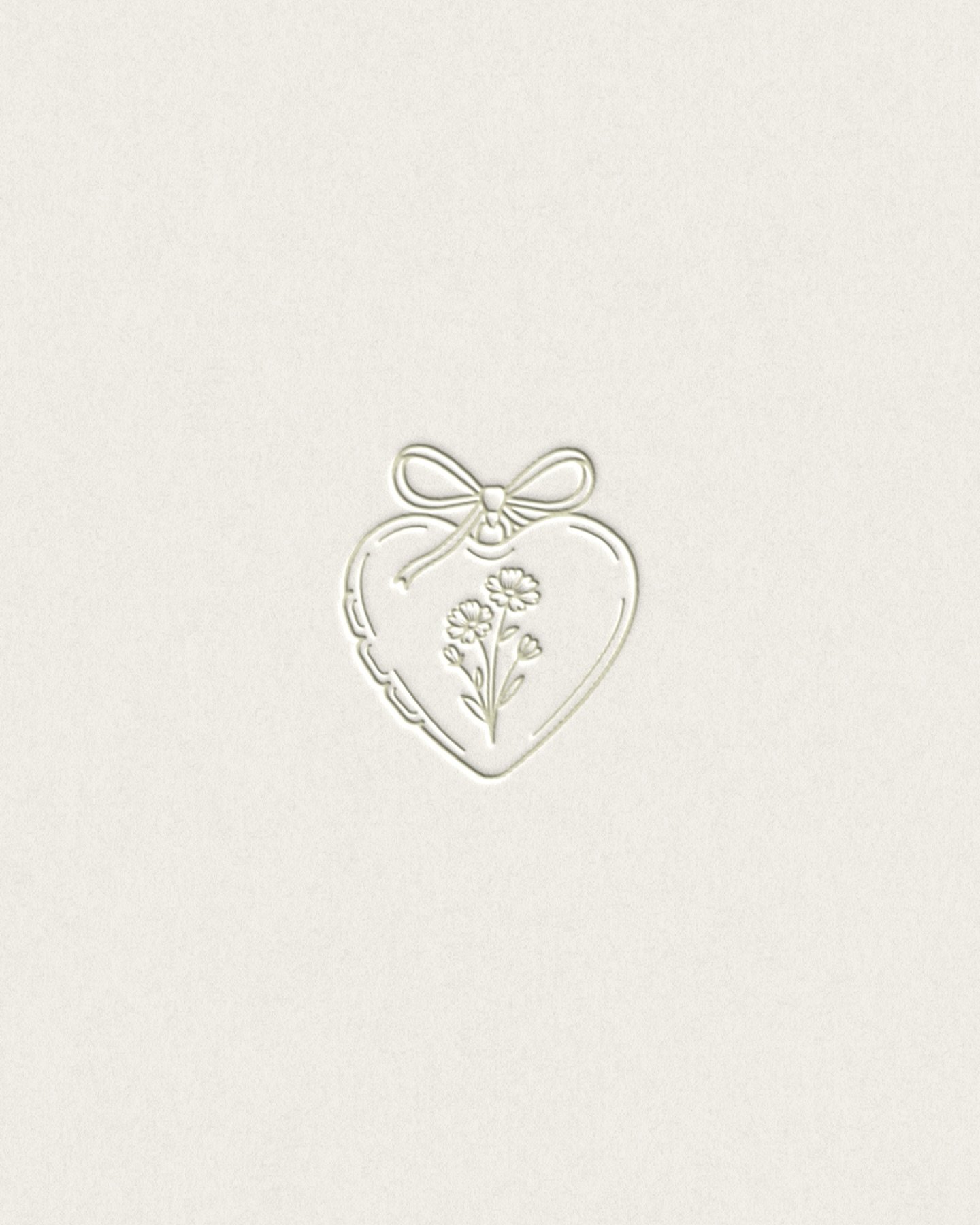 A super sweet logomark I designed as an earlier concept for a client project, rediscovered while exploring the Everwest archives 🤍

Inspired by vintage lockets, this heart-shaped mark features a delicate ribbon bow and soft floral illustration&mdash