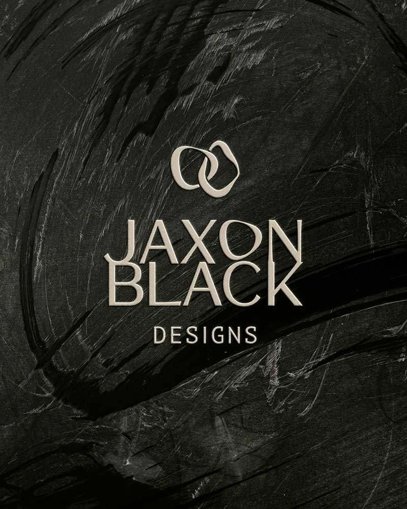 Close-up of Jaxon Black Designs logo