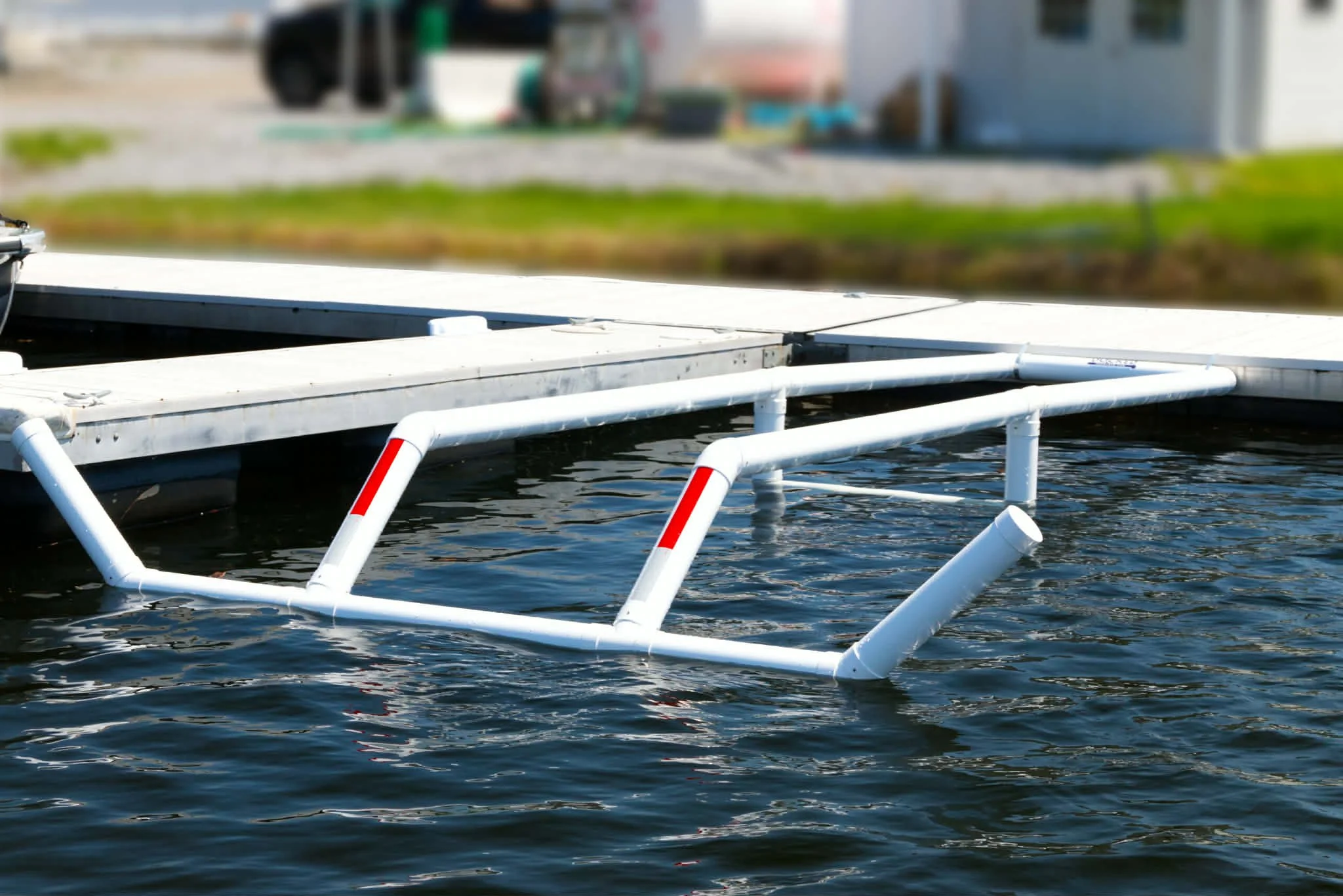 Docked Pontoon Docking System in a Maine Lake