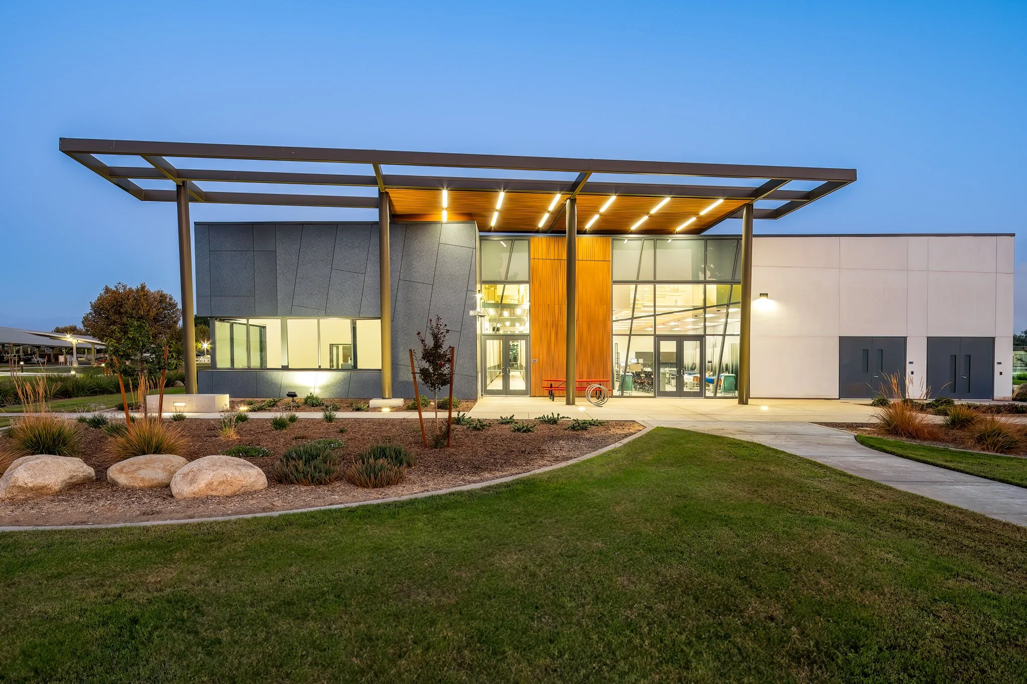 Sage Allied Health Building glass entrance twilight photo, Porterville College