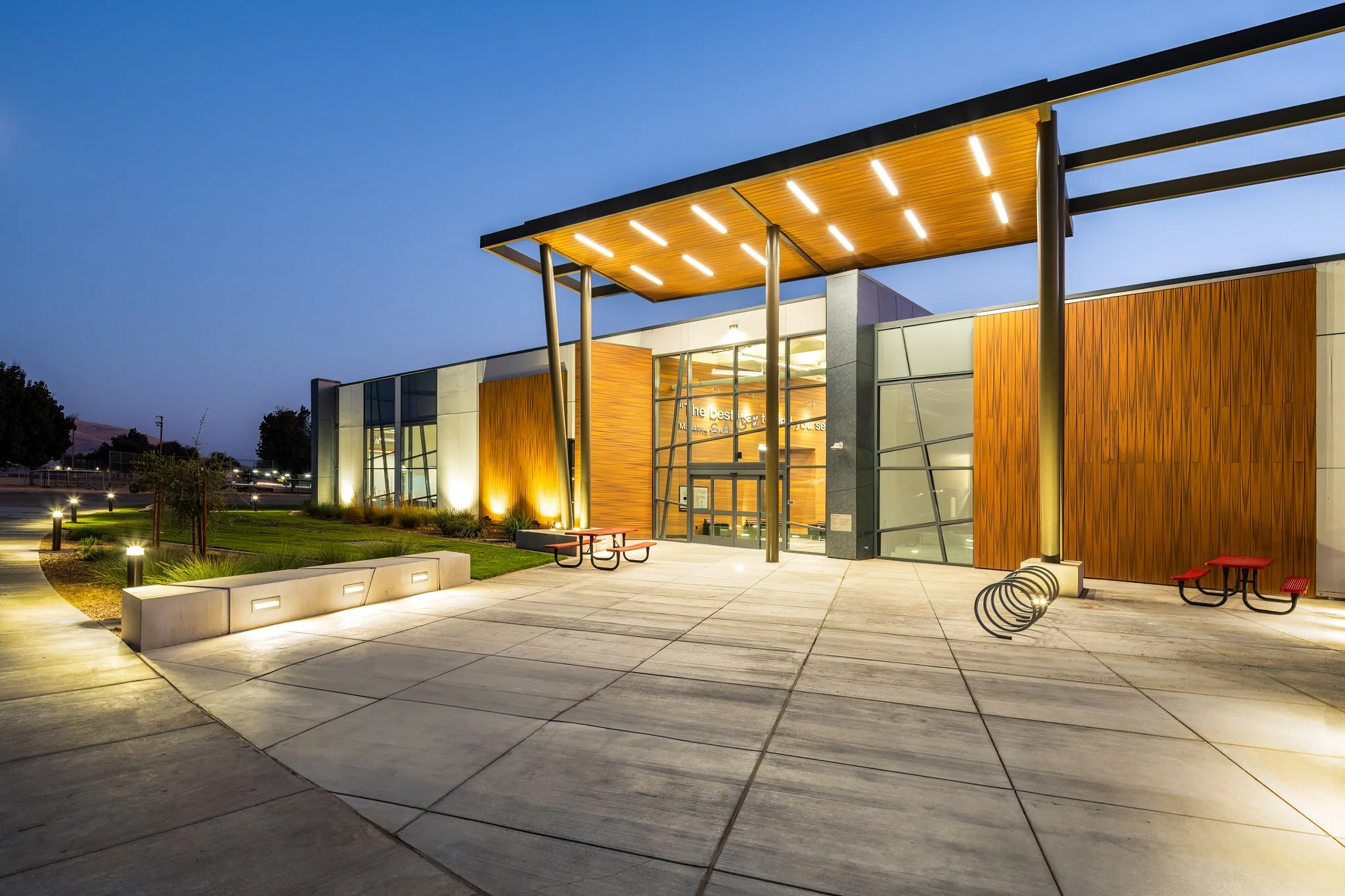 Sage Allied Health Building twilight exterior entrance, Porterville College, Teter Architects