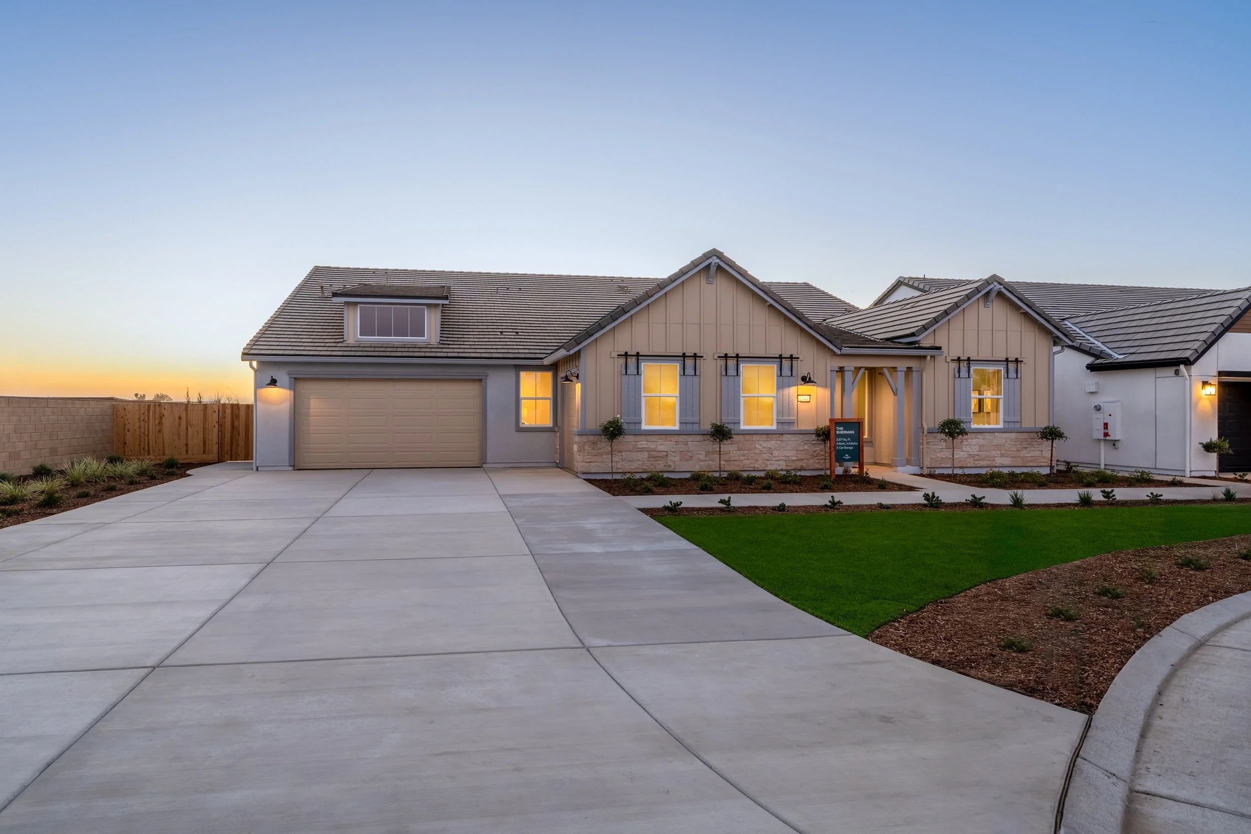 Wildflower model home twilight exterior, Woodside Homes, Visalia, CA