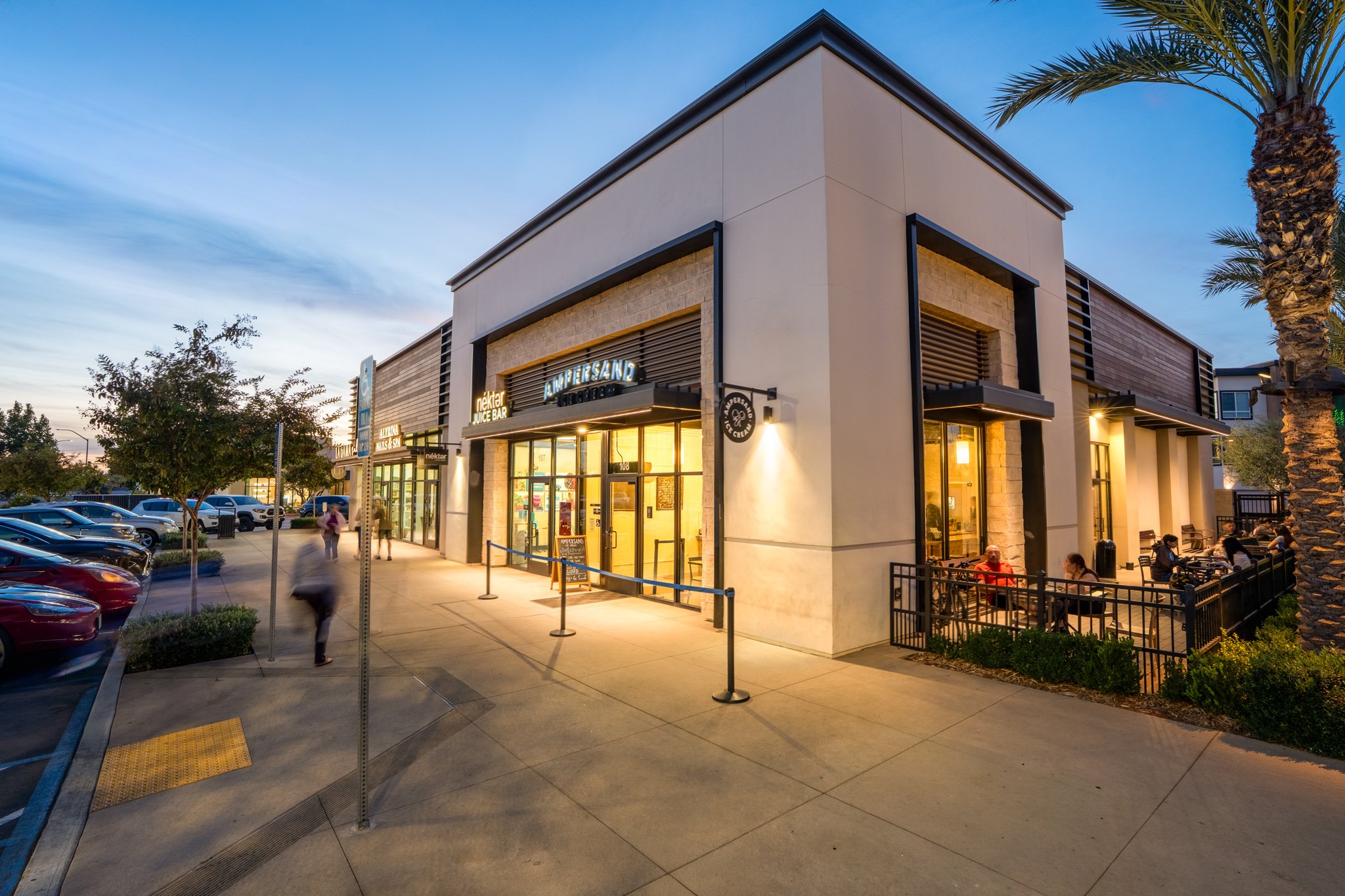 The Row at Heritage Grove retail plaza with pedestrians, Fresno, CA
