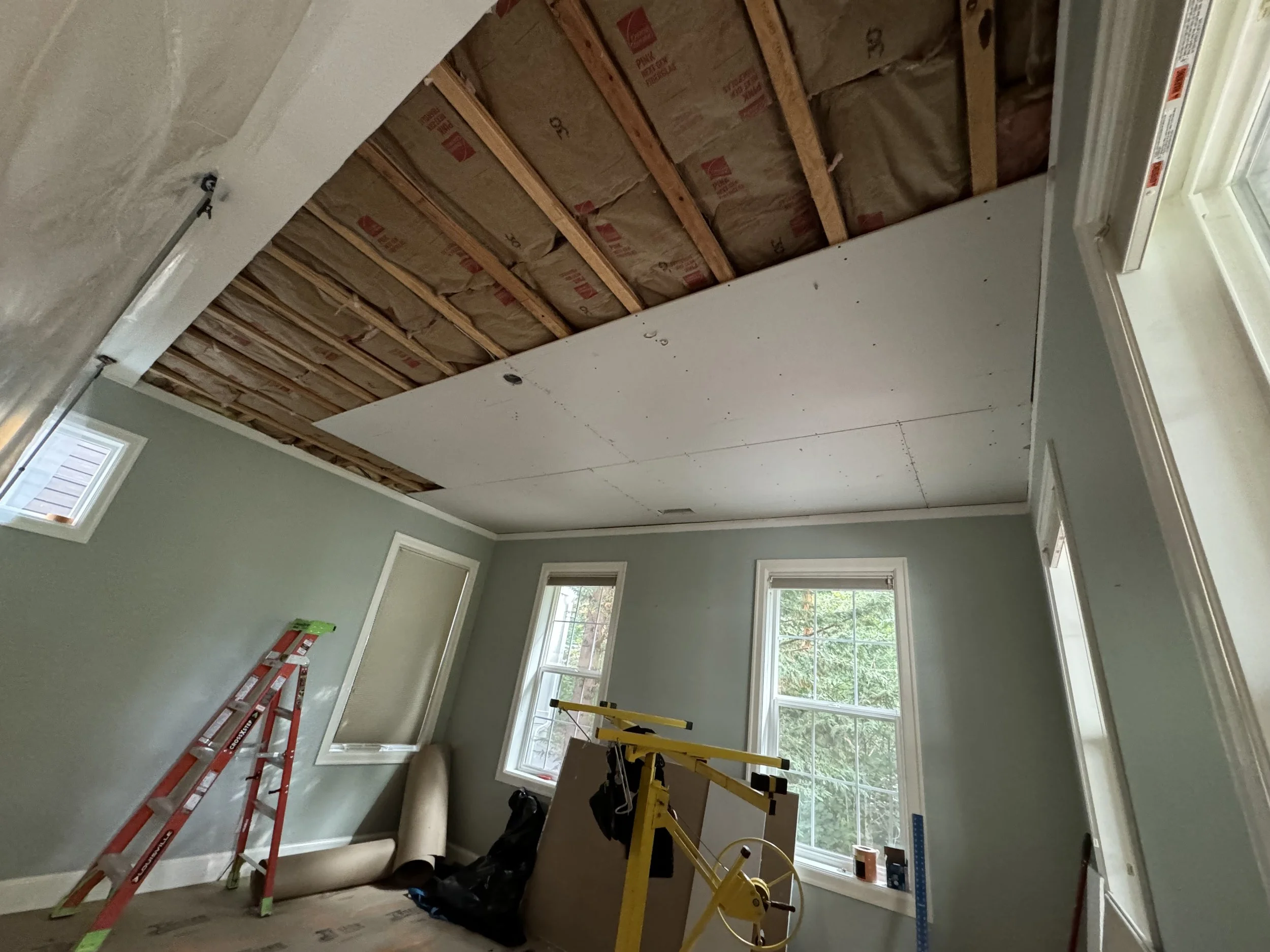 ceiling damaged by a bathtub overflow