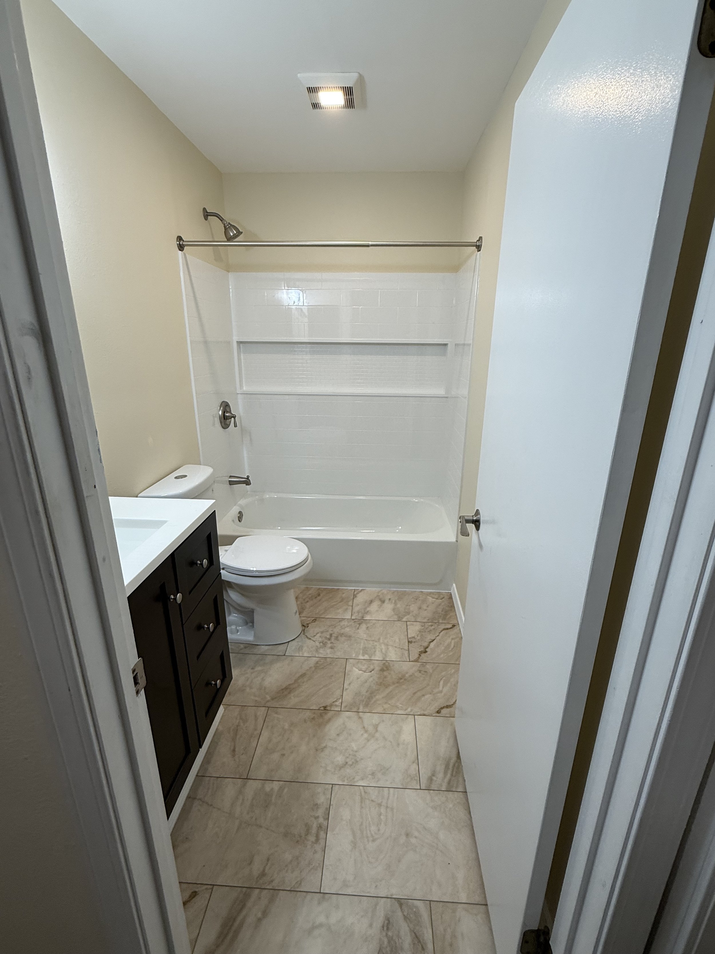 Bathroom completed after water damage.