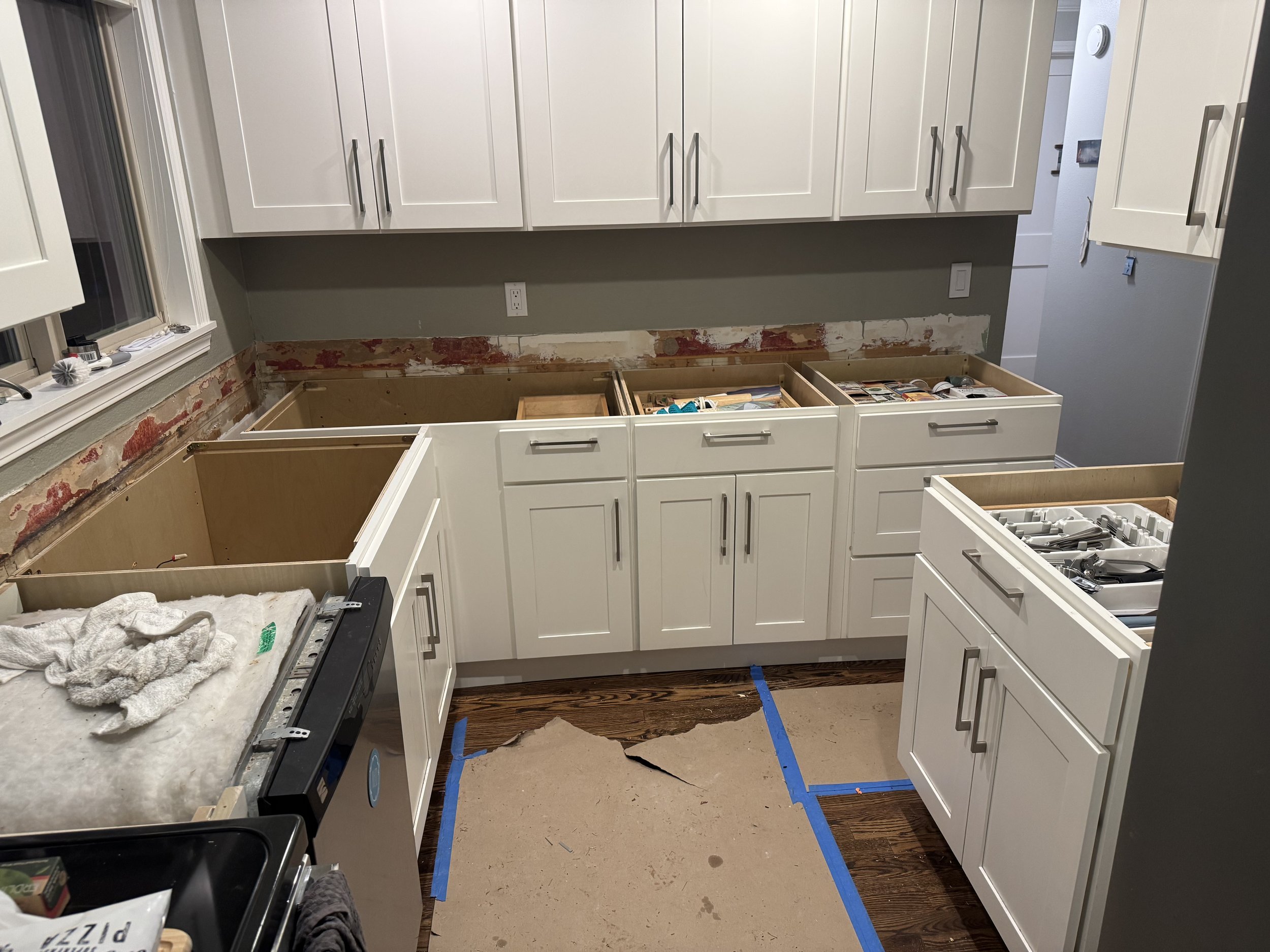 Kitchen had water damage. Cabinets and countertops had to be replaced in Kenmore, WA