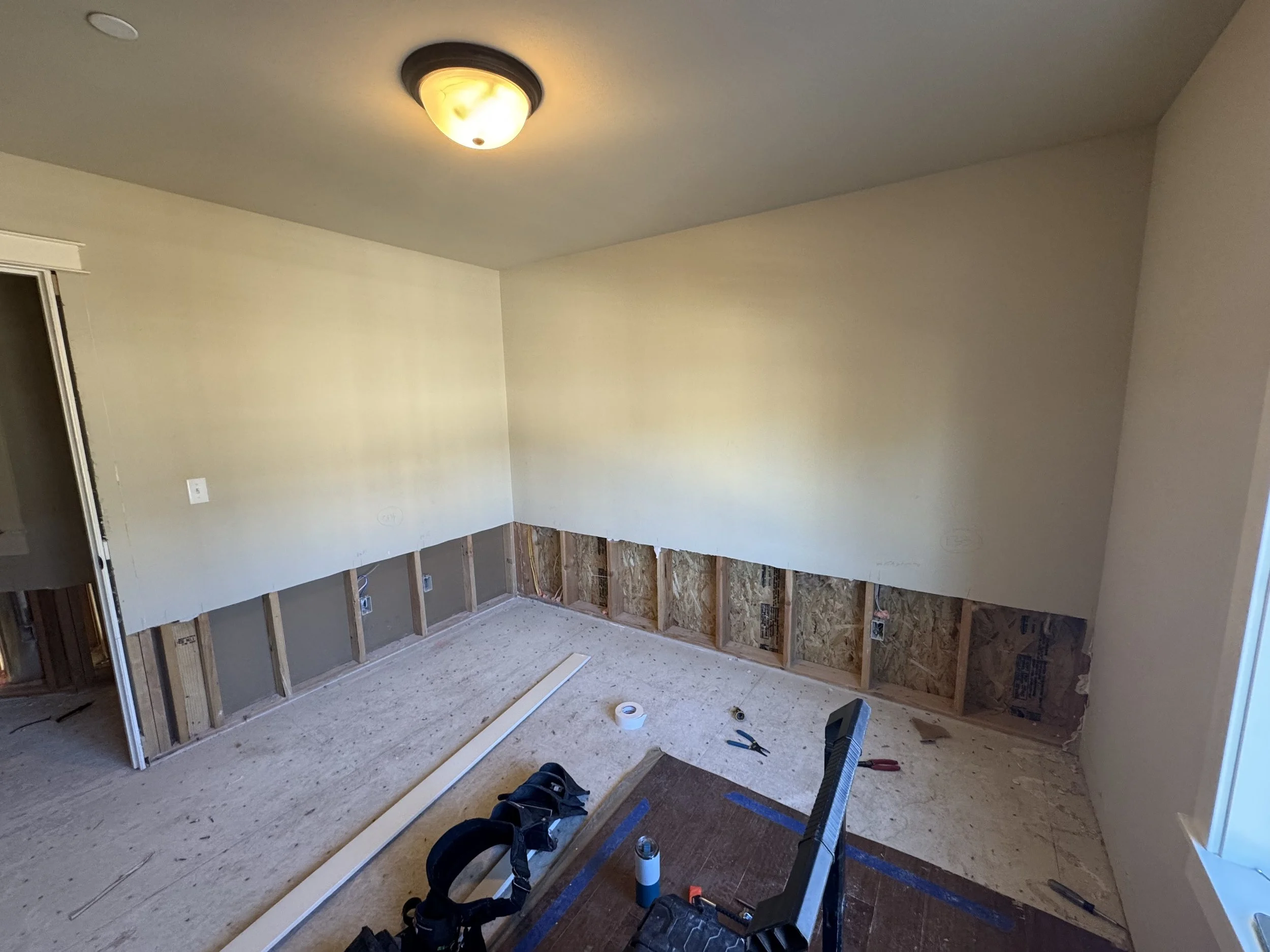 Flood cut in water damaged bedroom.