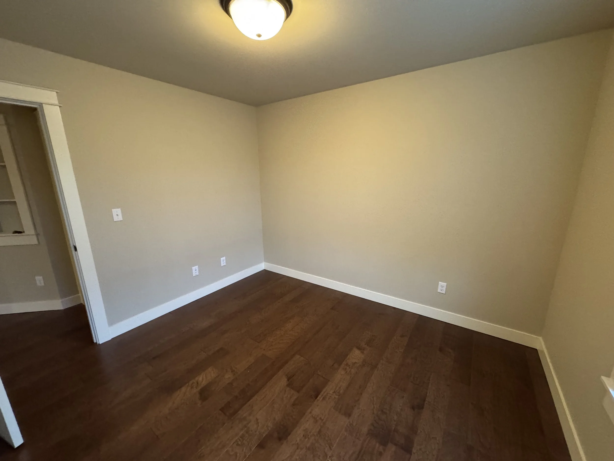 Reconstruction completed in Bothell, WA. Drywall, trim, and hardwood flooring was repaired.