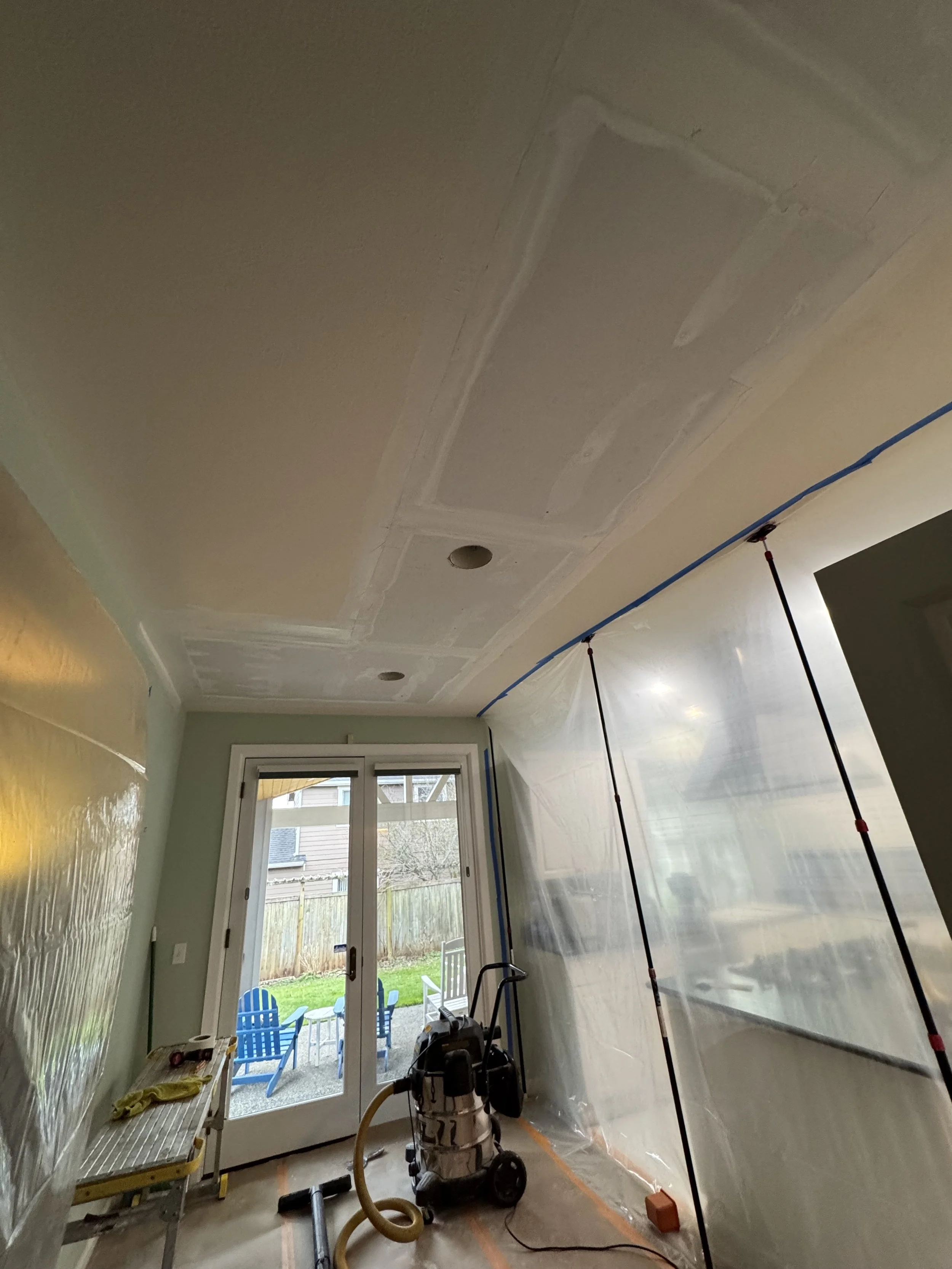 Second coat of drywall mud is completed in Bothell, WA