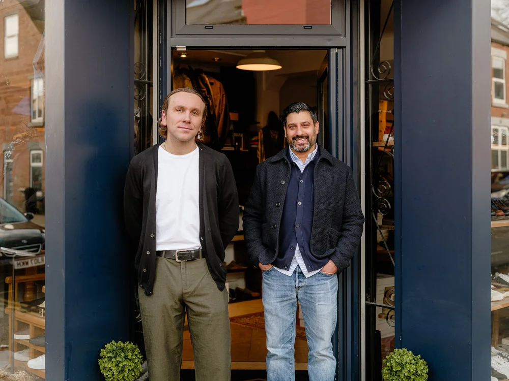 The Partners team in the shop doorway on Hickmott Road