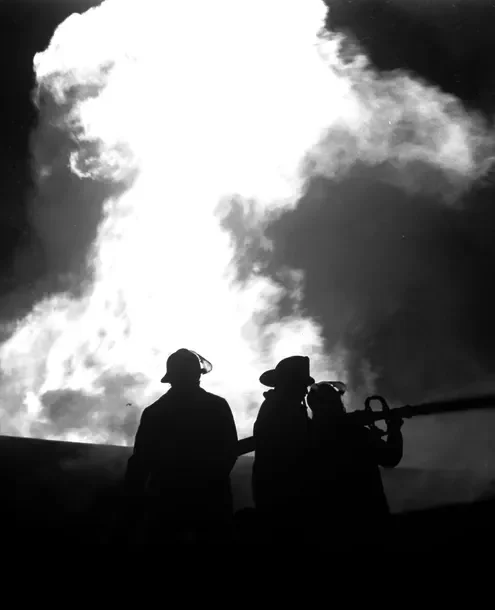 Photo of original fence company building on fire
