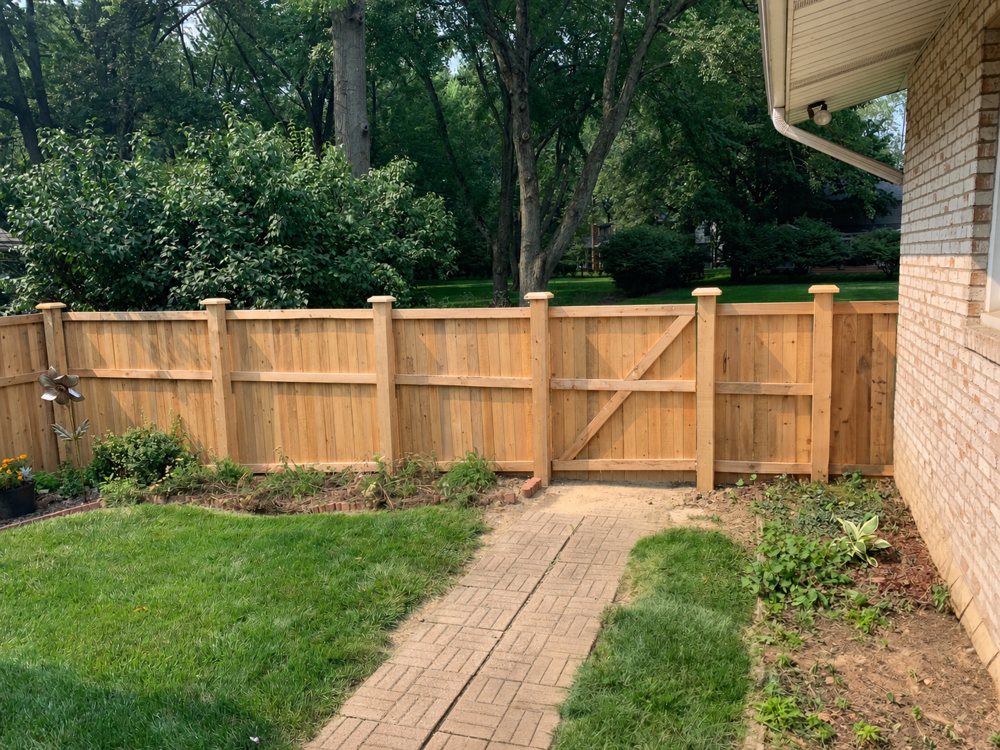 Cedar wooden privacy fence around a backyard in Dayton, Ohio